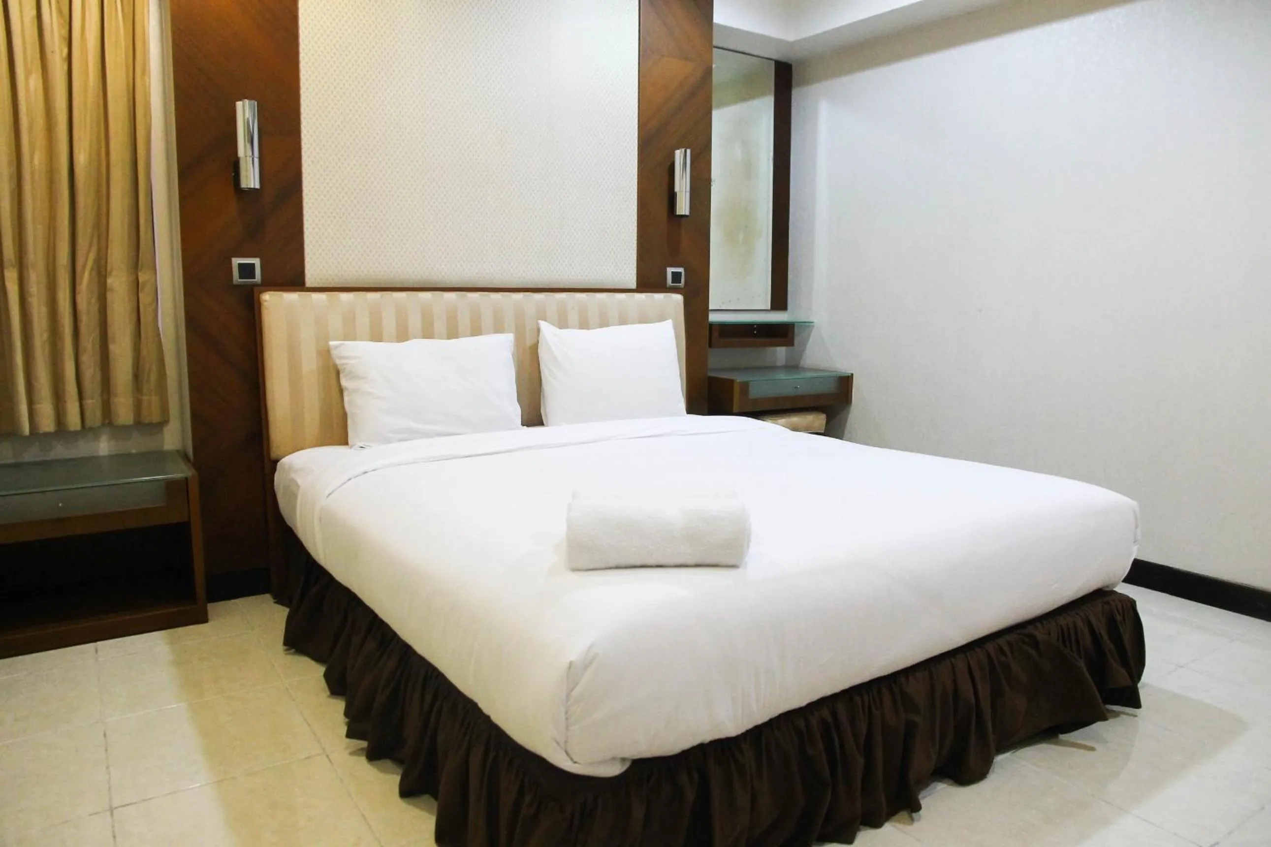 2BR Family Sudirman Tower Condominium Apartment near Plaza Semanggi By Travelio