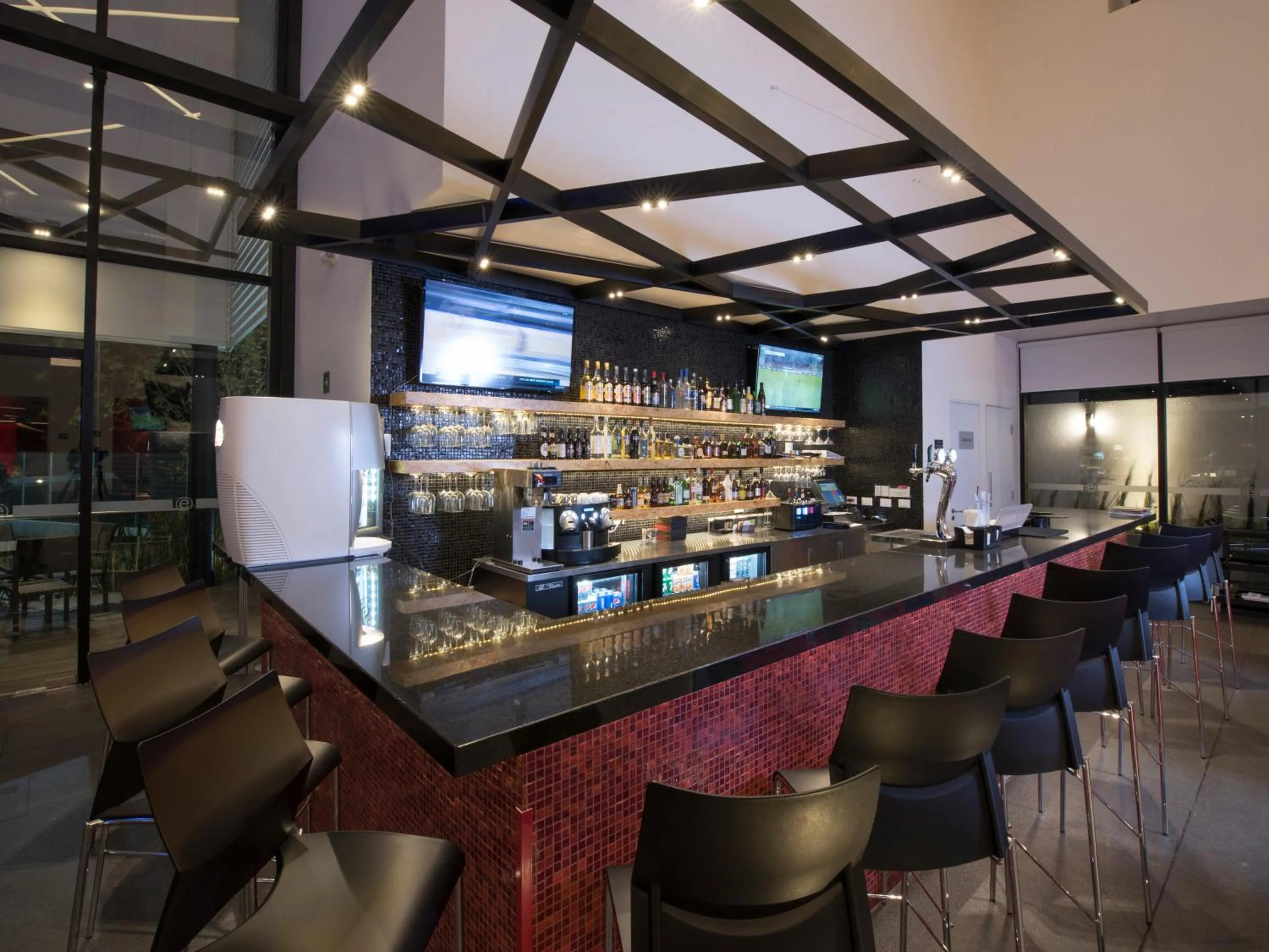 Lounge or bar in Ramada Encore by Wyndham Guadalajara Sur