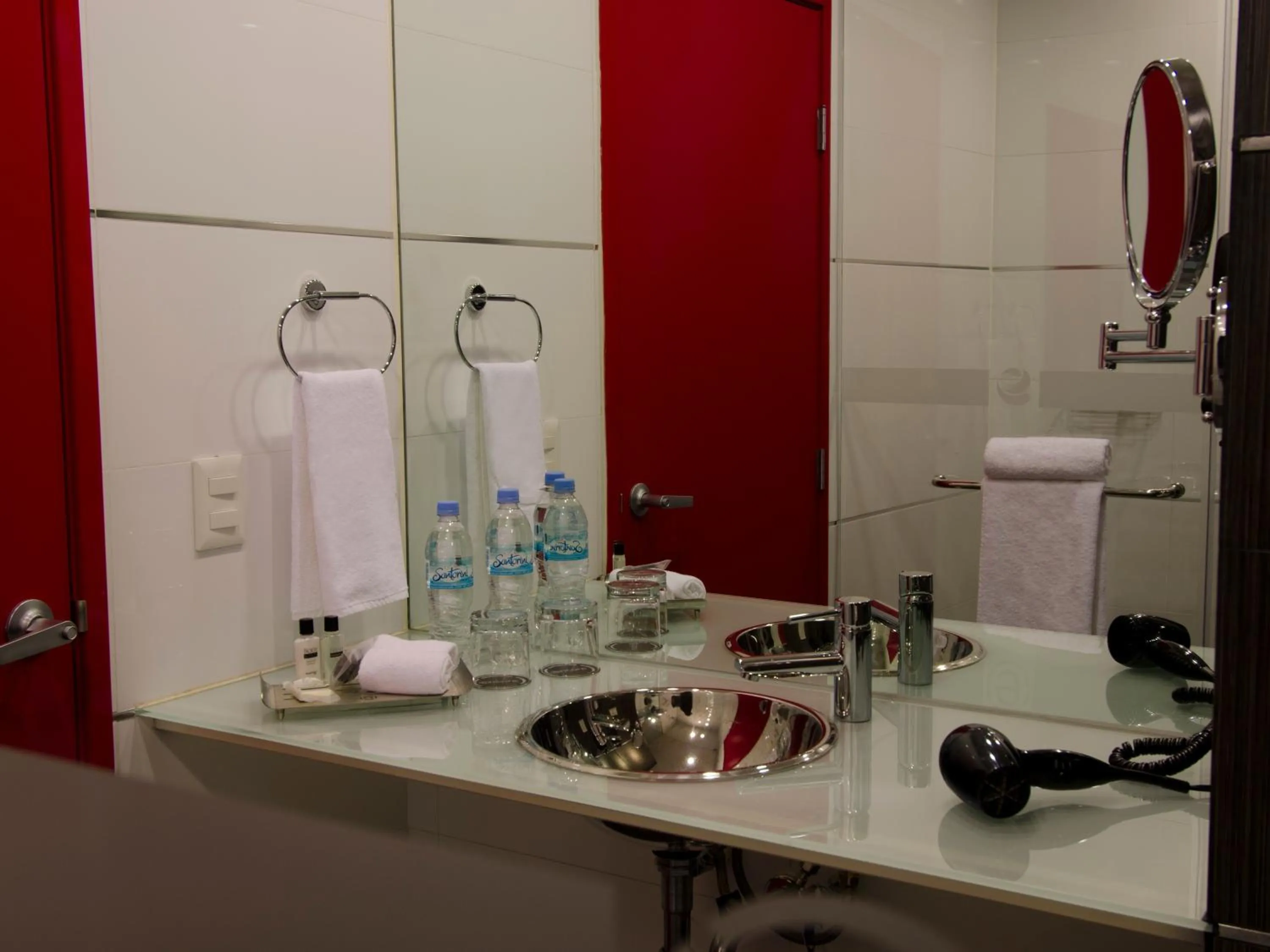 Toilet in Ramada Encore by Wyndham Guadalajara Sur