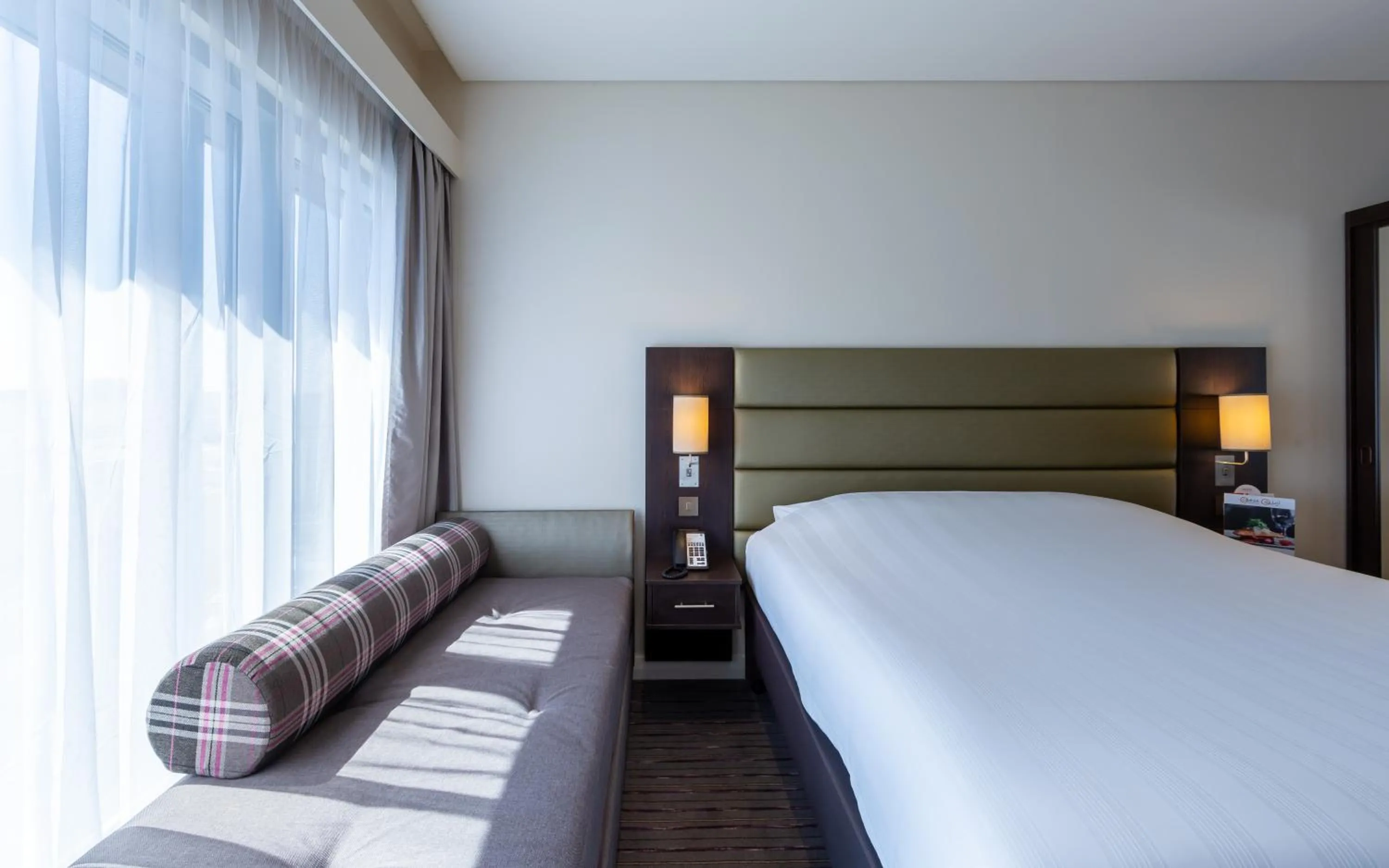 Seating area, Bed in Premier Inn Doha Airport