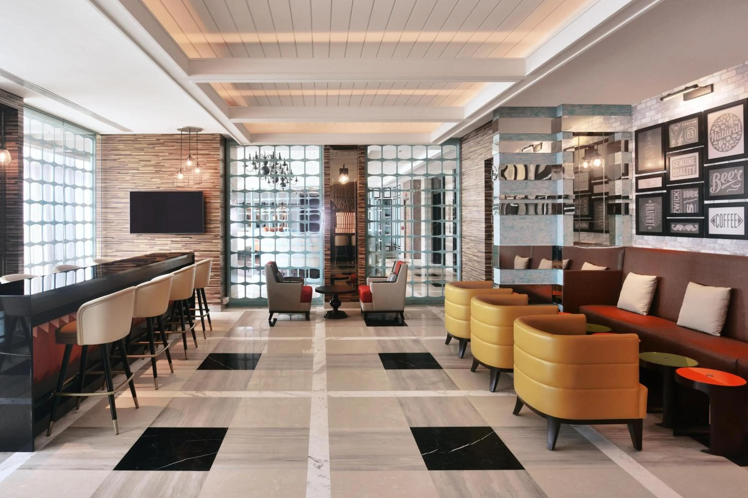 Lounge or bar in Four Points by Sheraton Kochi Infopark