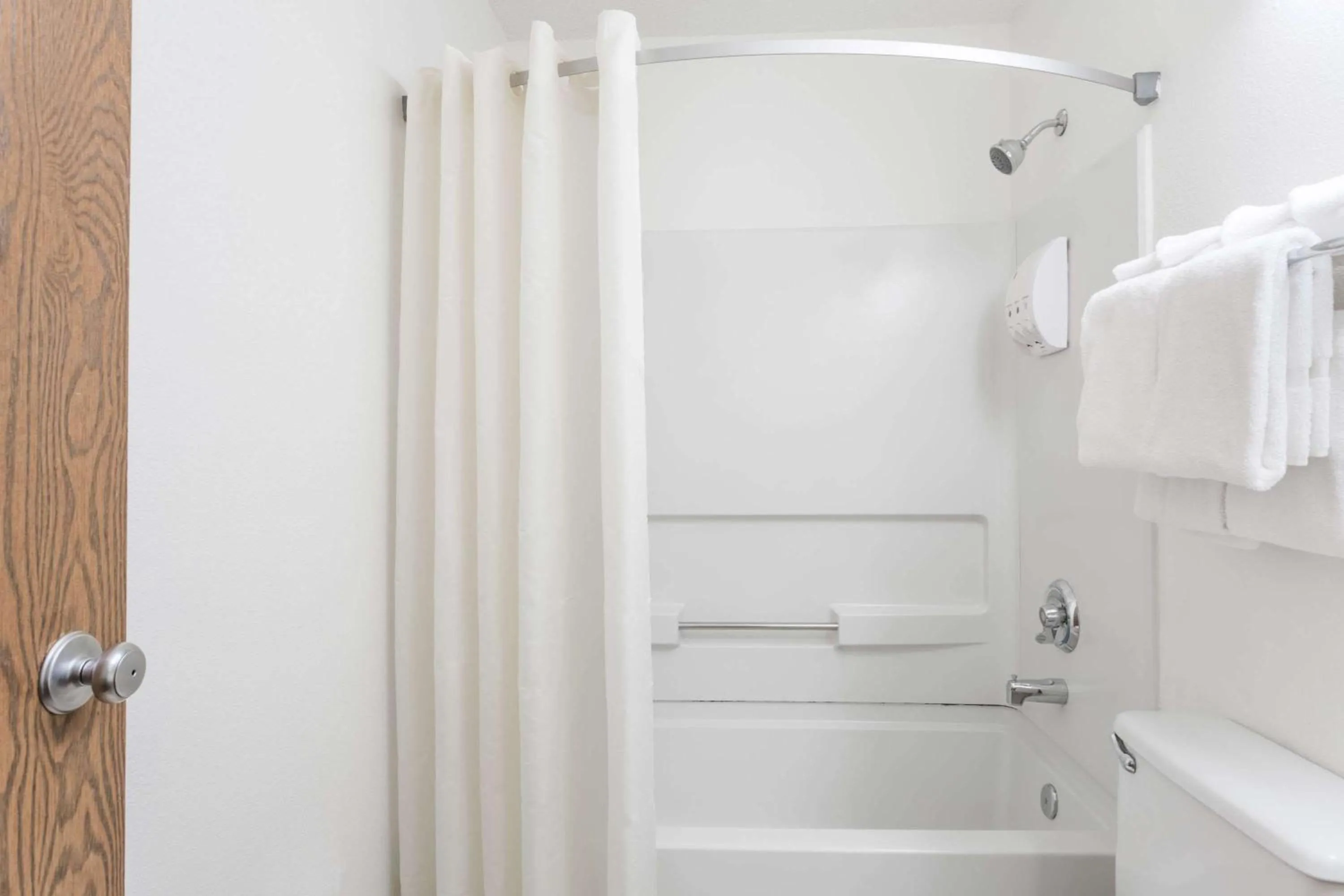 Bathroom in Super 8 by Wyndham Hampton