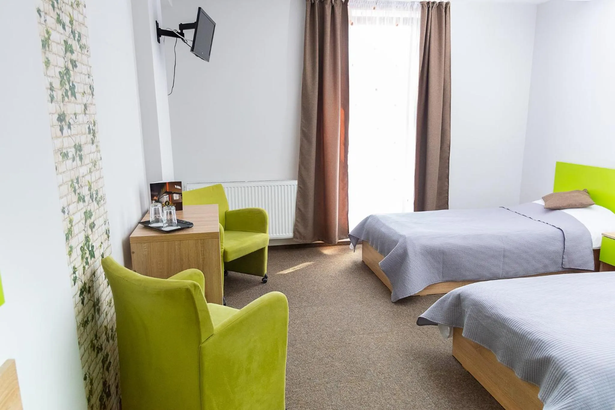 Seating area, Bed in Vila William’s