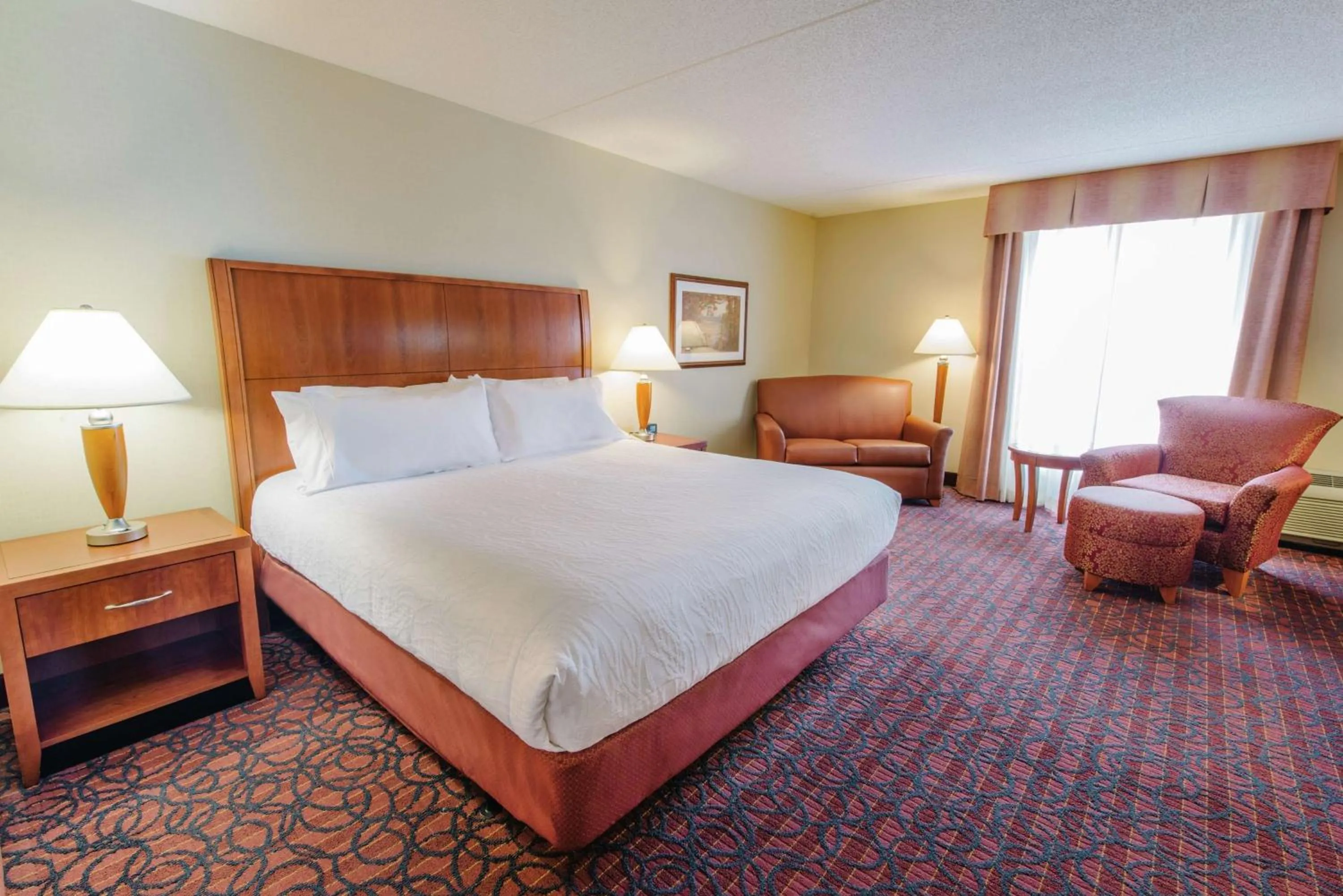 Living room, Bed in Hilton Garden Inn Manchester Downtown