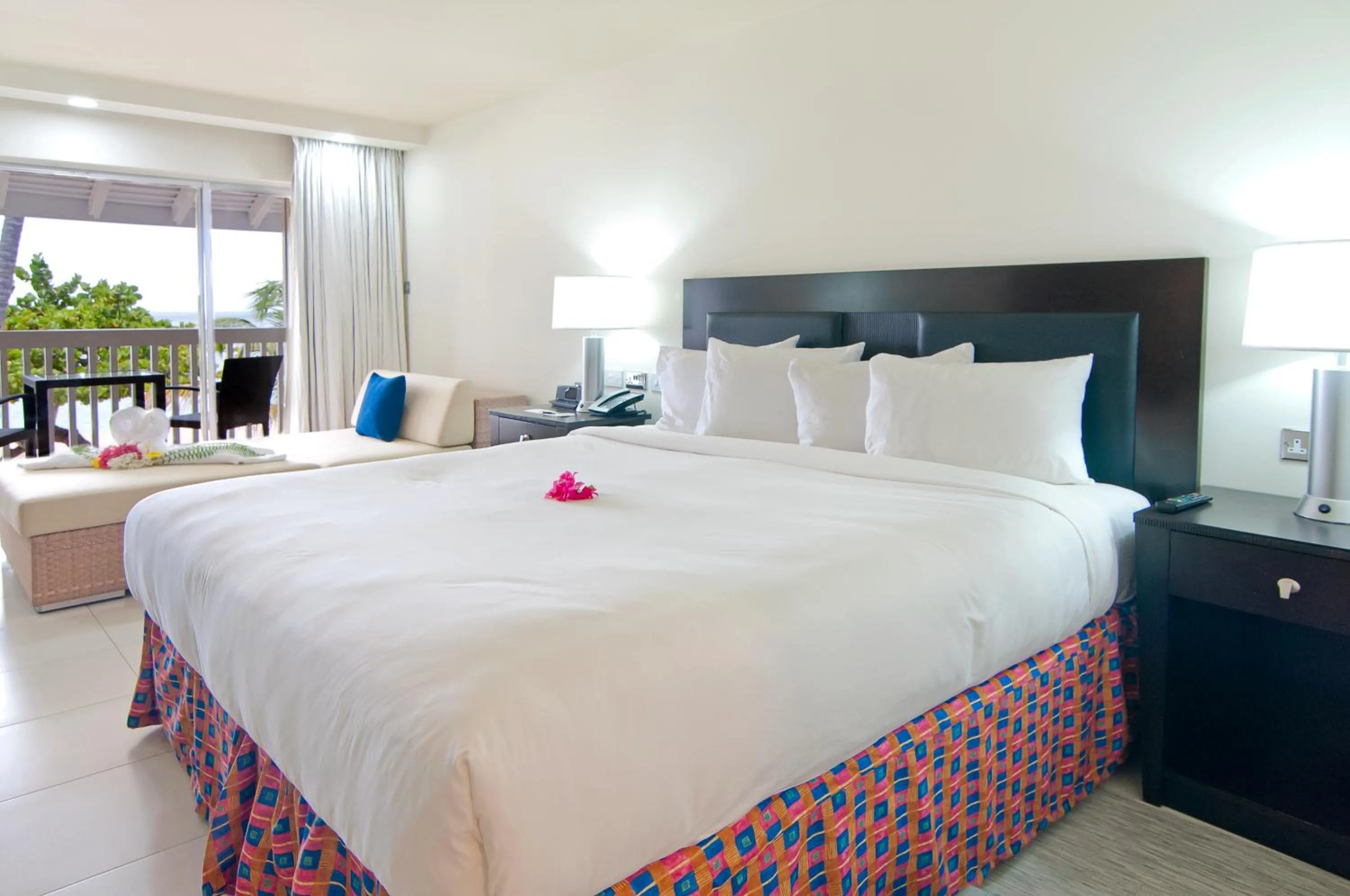 Photo of the whole room, Bed in Radisson Grenada Beach Resort