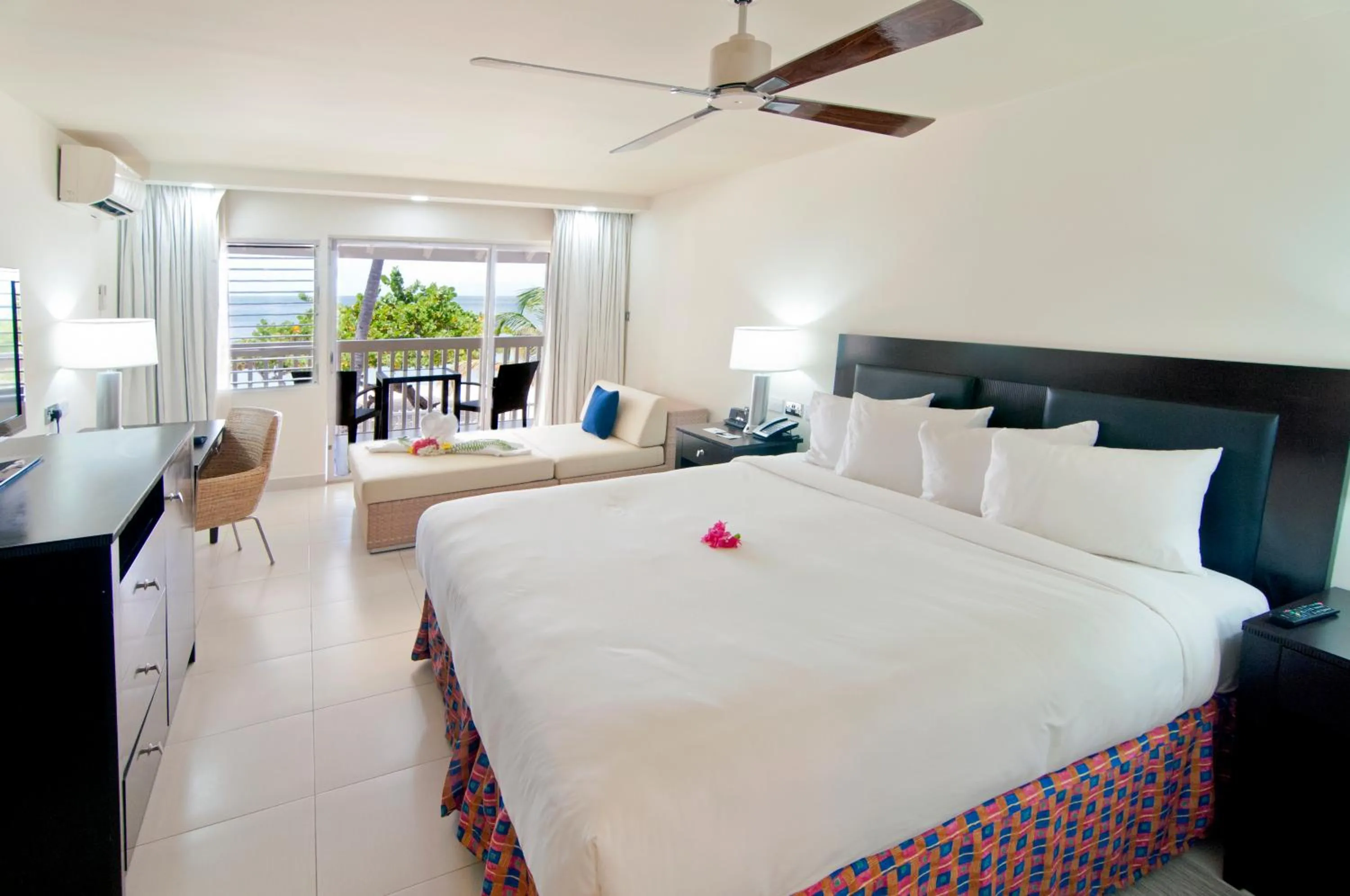 Photo of the whole room, Bed in Radisson Grenada Beach Resort