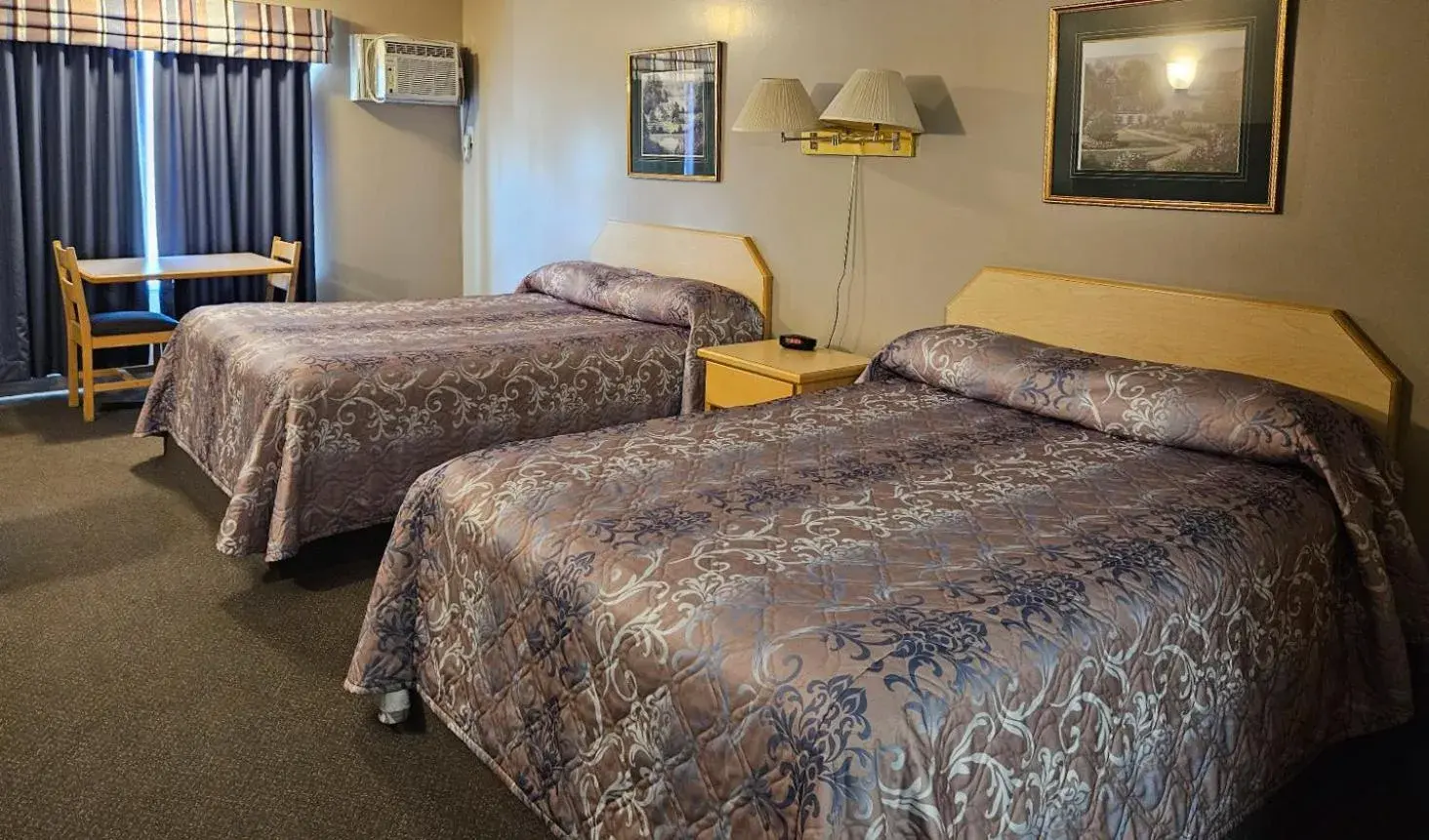 Queen Room with Two Queen Beds in Perfect Inns & Suites Queen Room with Two Queen Beds in Perfect Inns & Suites