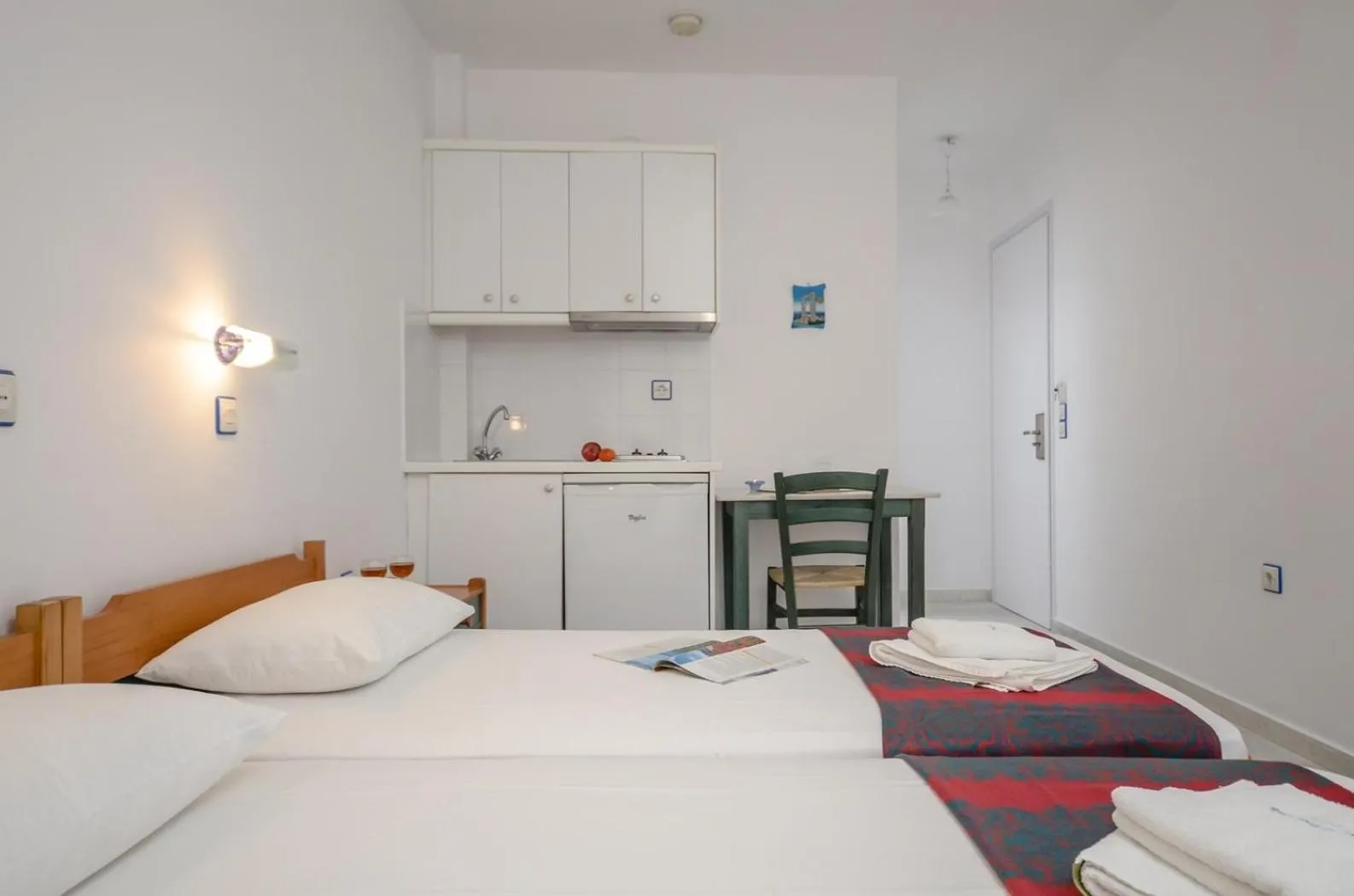 Spring, Bed in Nostos Studios at Saint George beach Agios Georgios Chora Naxos town