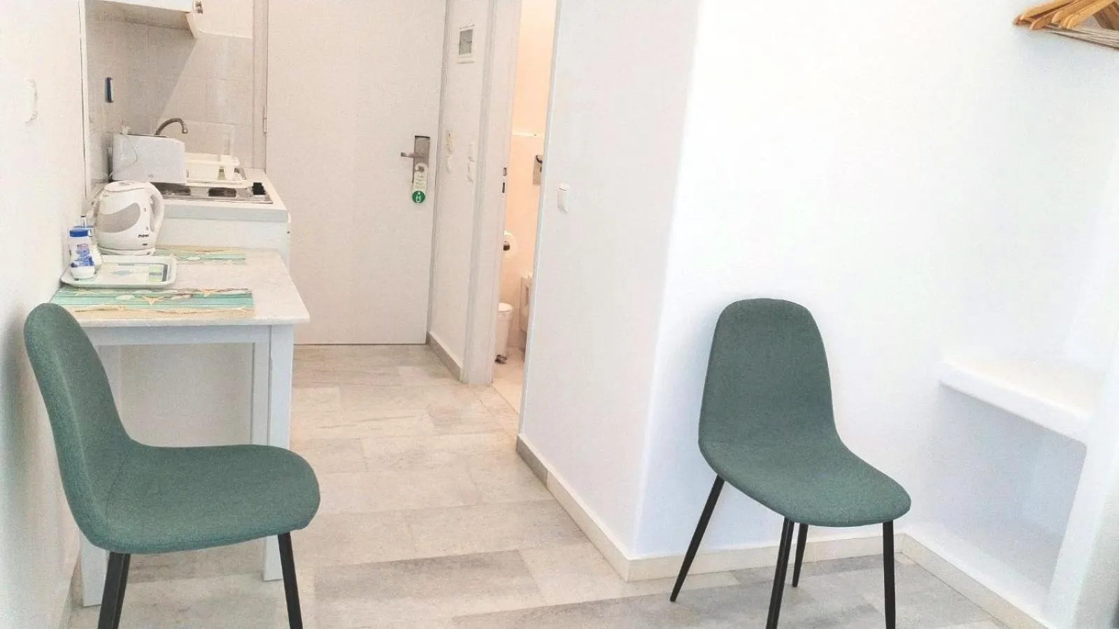 Kitchen or kitchenette in Nostos Studios at Saint George beach Agios Georgios Chora Naxos town