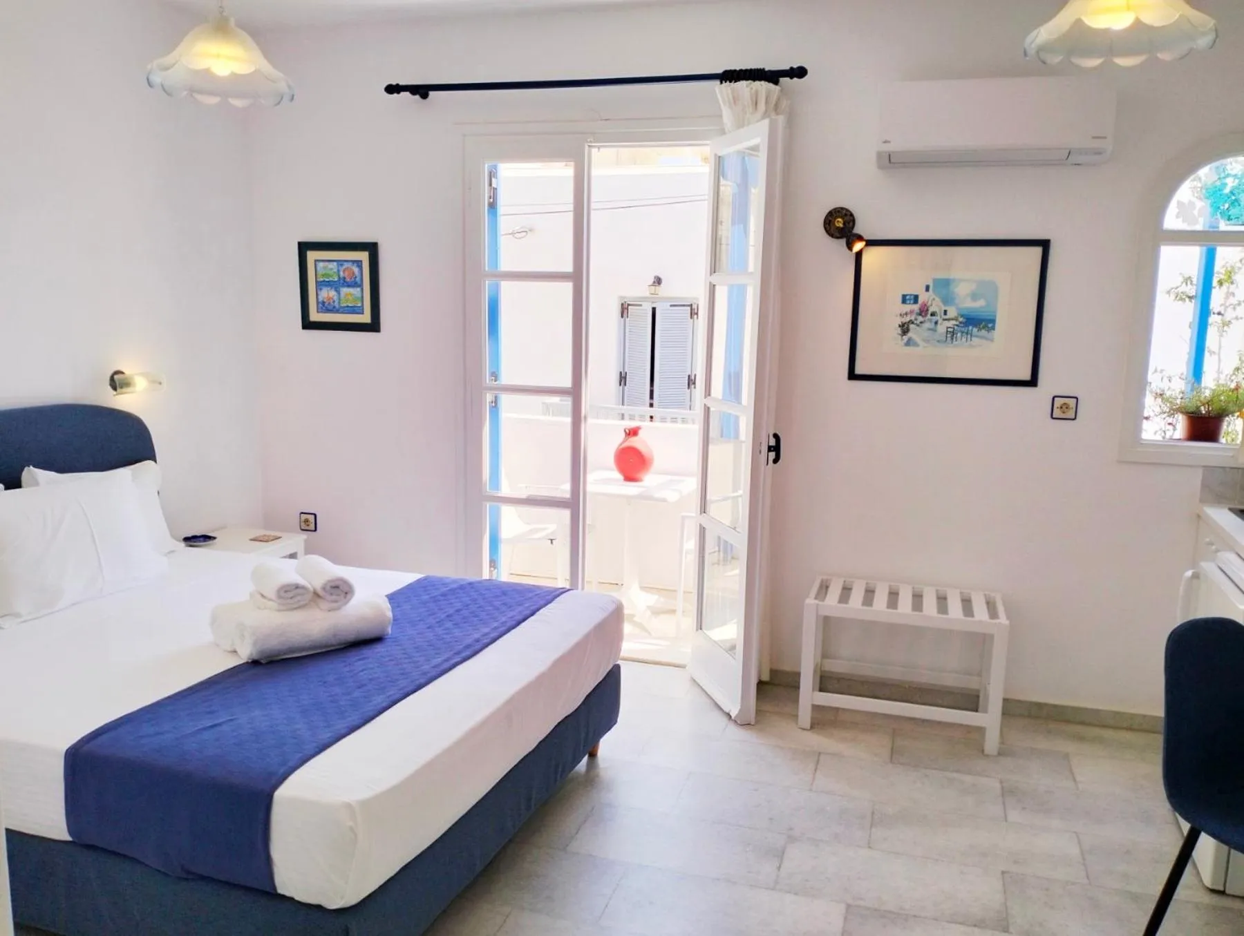 Bedroom, Bed in Nostos Studios at Saint George beach Agios Georgios Chora Naxos town