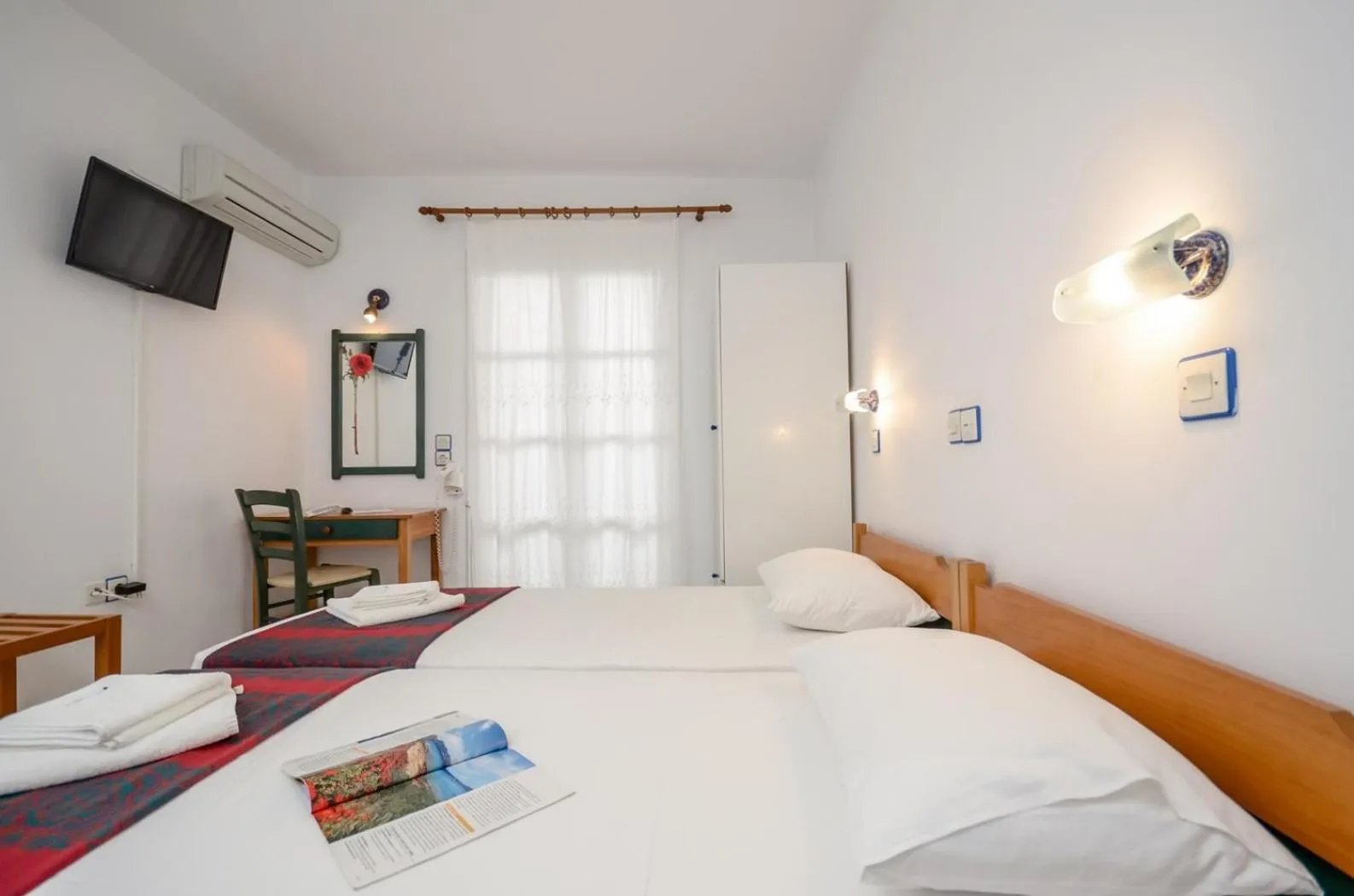 Spring, Bed in Nostos Studios at Saint George beach Agios Georgios Chora Naxos town