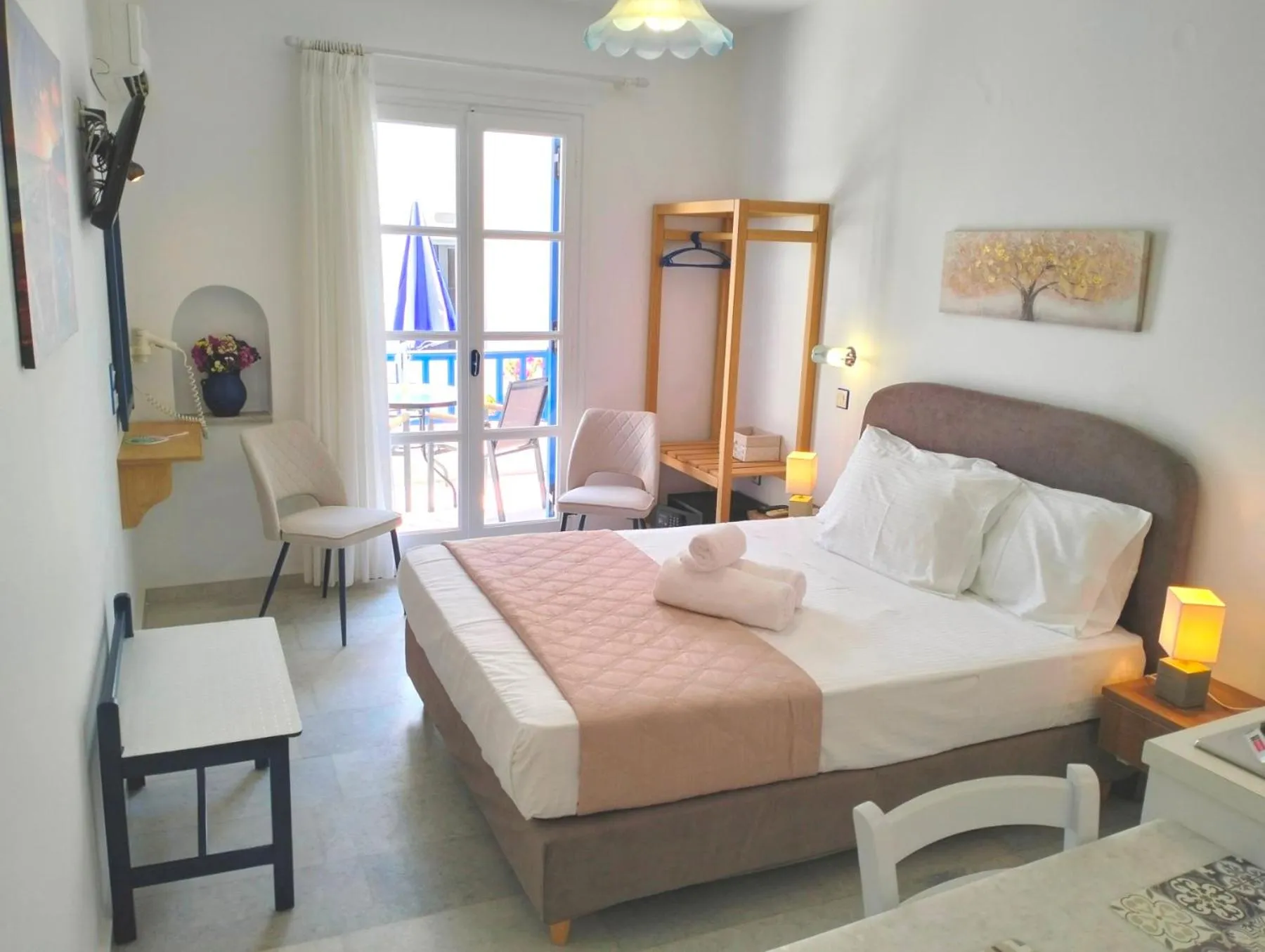 Bedroom, Bed in Nostos Studios at Saint George beach Agios Georgios Chora Naxos town