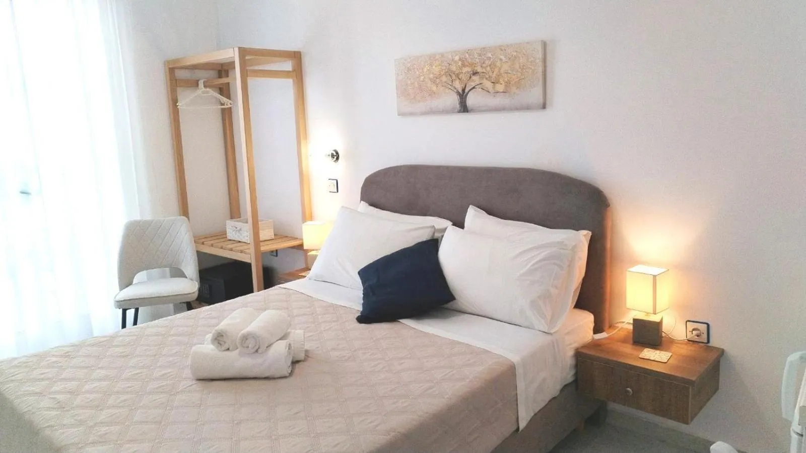 Bedroom, Bed in Nostos Studios at Saint George beach Agios Georgios Chora Naxos town