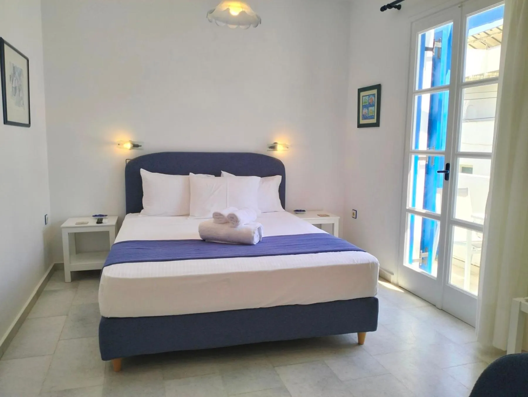 Bedroom, Bed in Nostos Studios at Saint George beach Agios Georgios Chora Naxos town