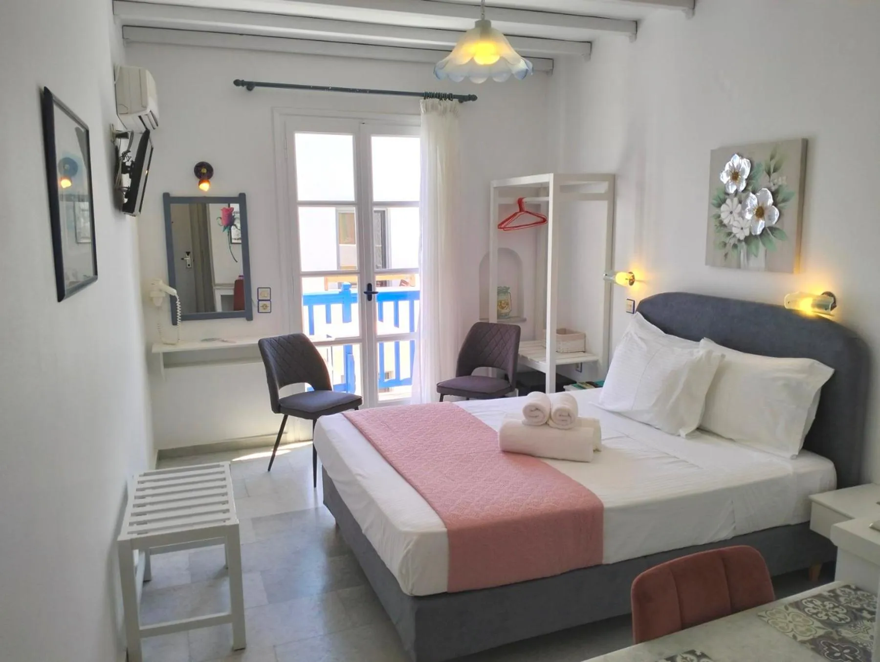 Bedroom, Bed in Nostos Studios at Saint George beach Agios Georgios Chora Naxos town