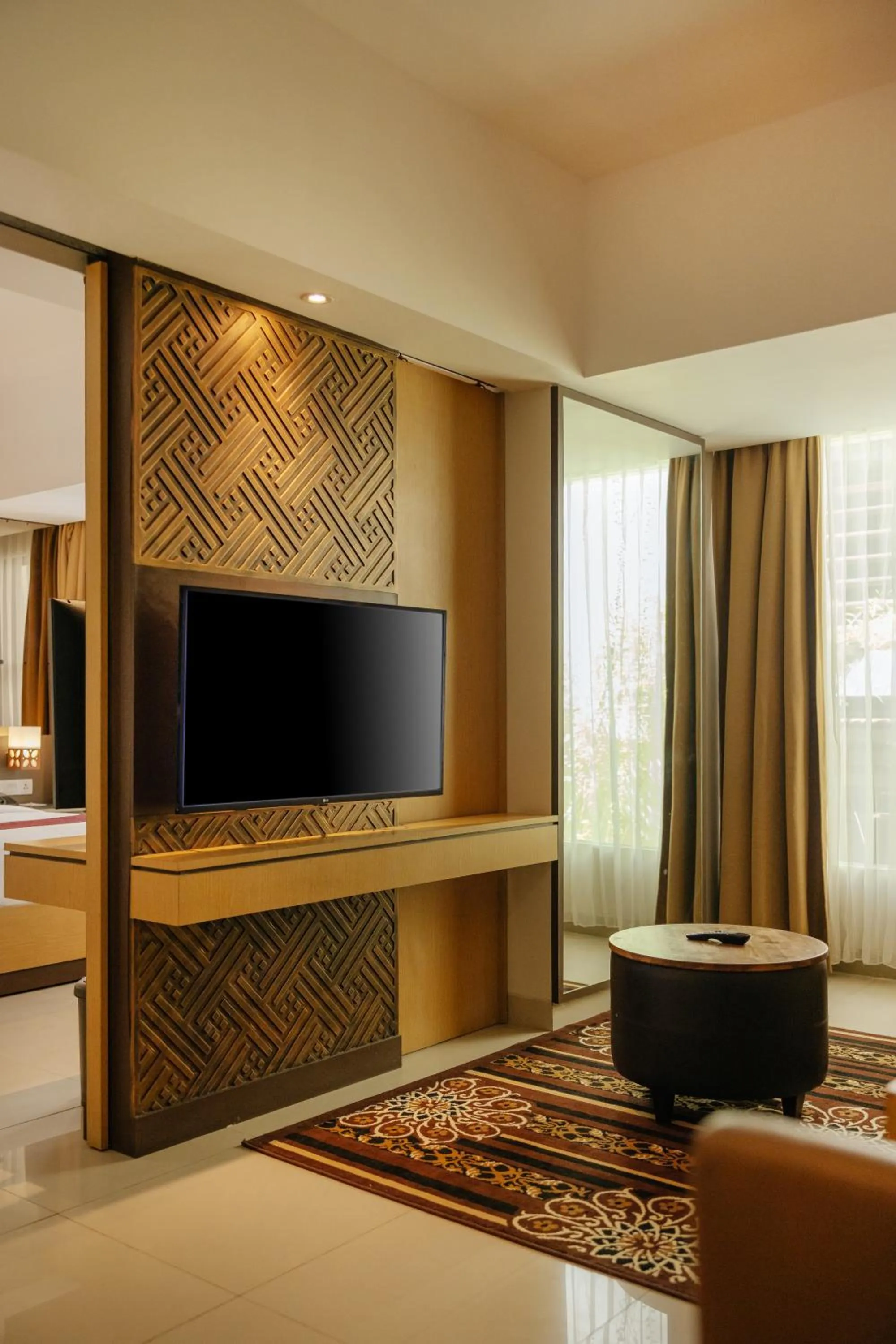 Communal lounge/ TV room in Horison Ultima Seminyak Bali - CHSE Certified