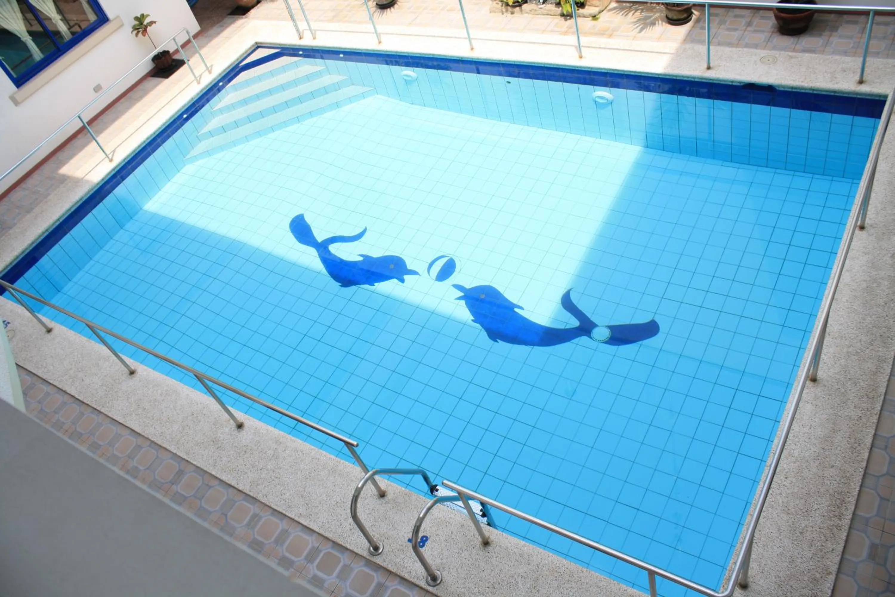 Swimming pool in Dumaguete Springs Apartment