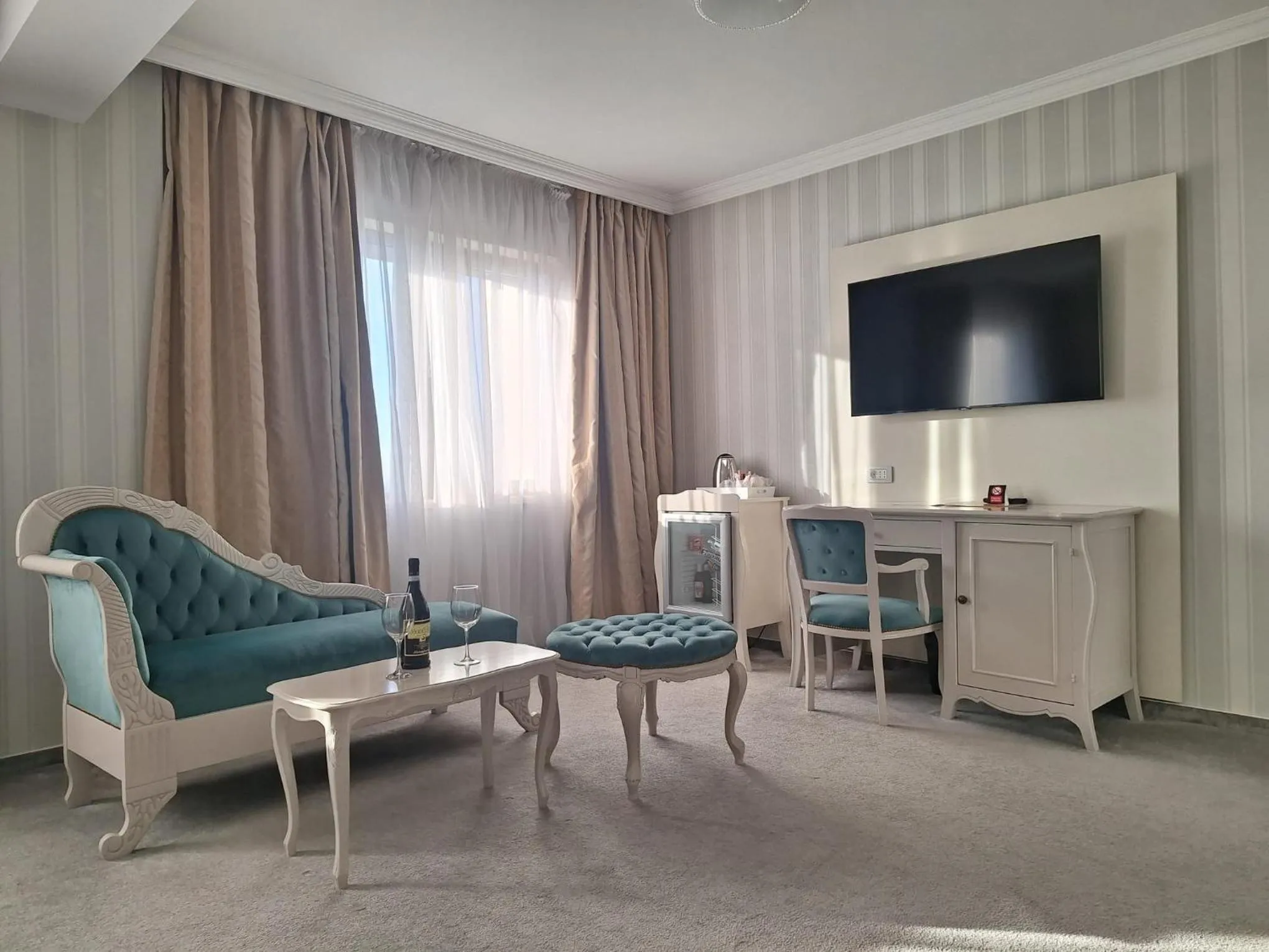 Seating area in Hotel Roman by Dumbrava Business Resort