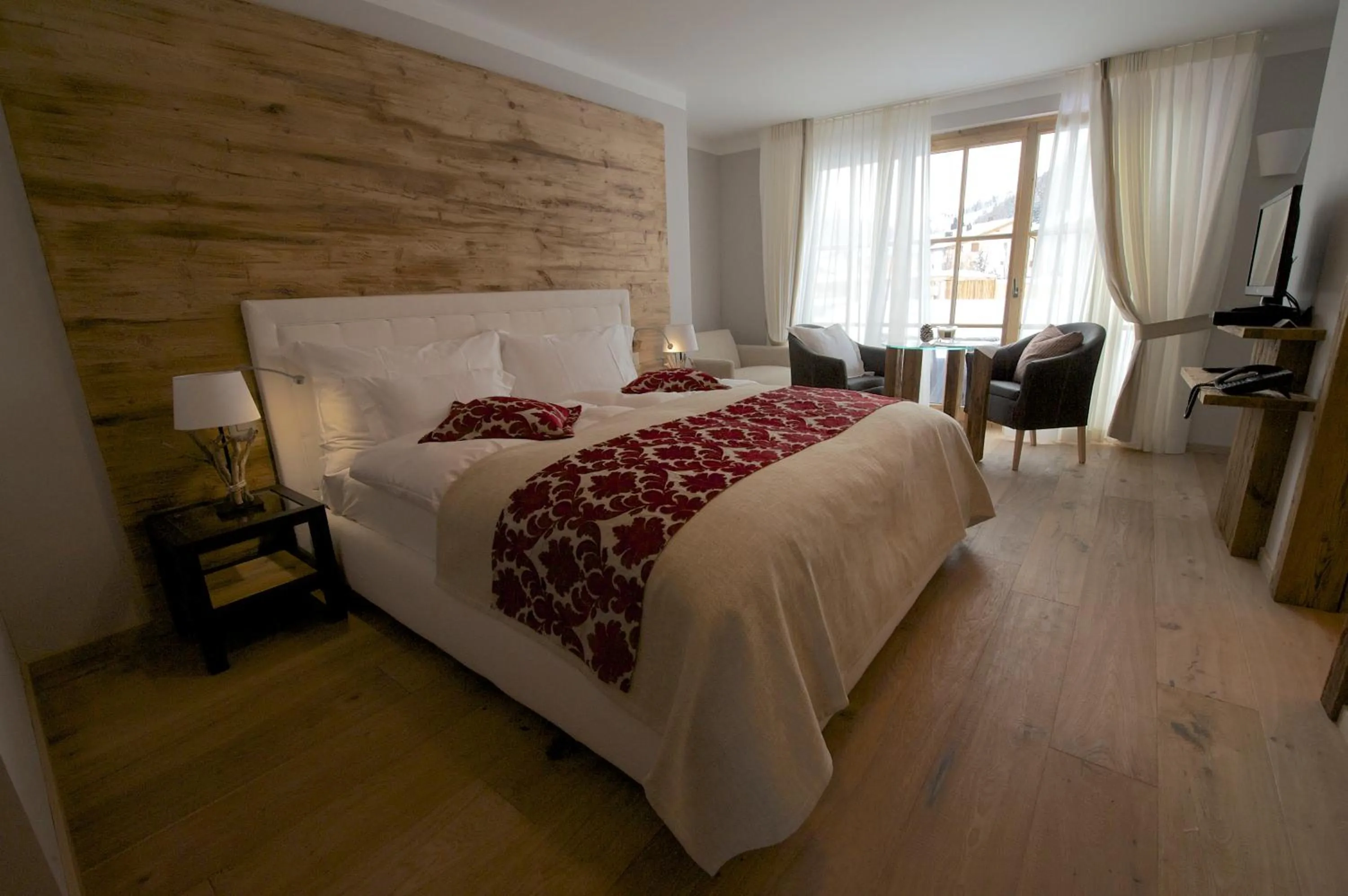 Photo of the whole room, Bed in Hotelino Petit Chalet