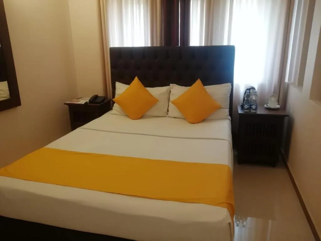 Bed in Forever City Hotel