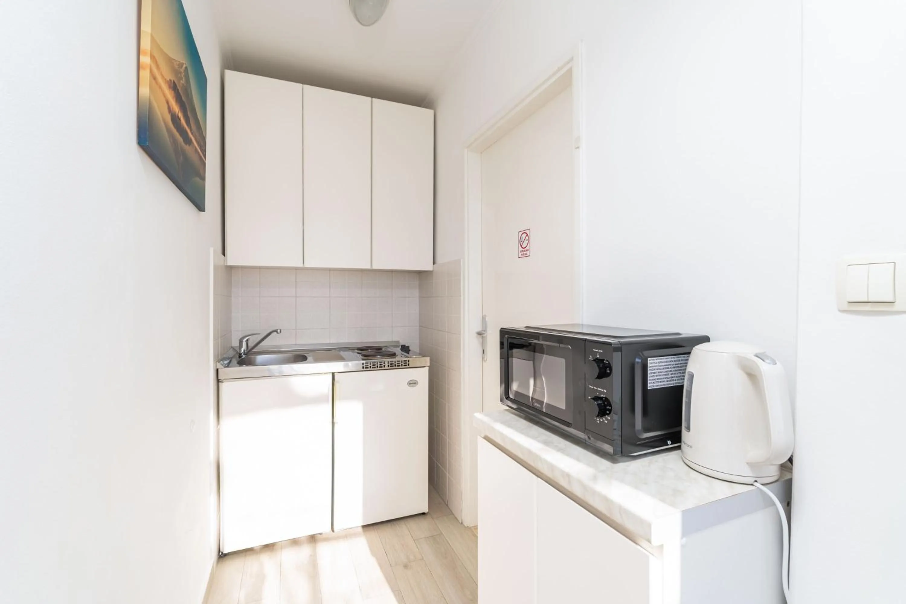 Kitchen or kitchenette in Apartments and Room Lora