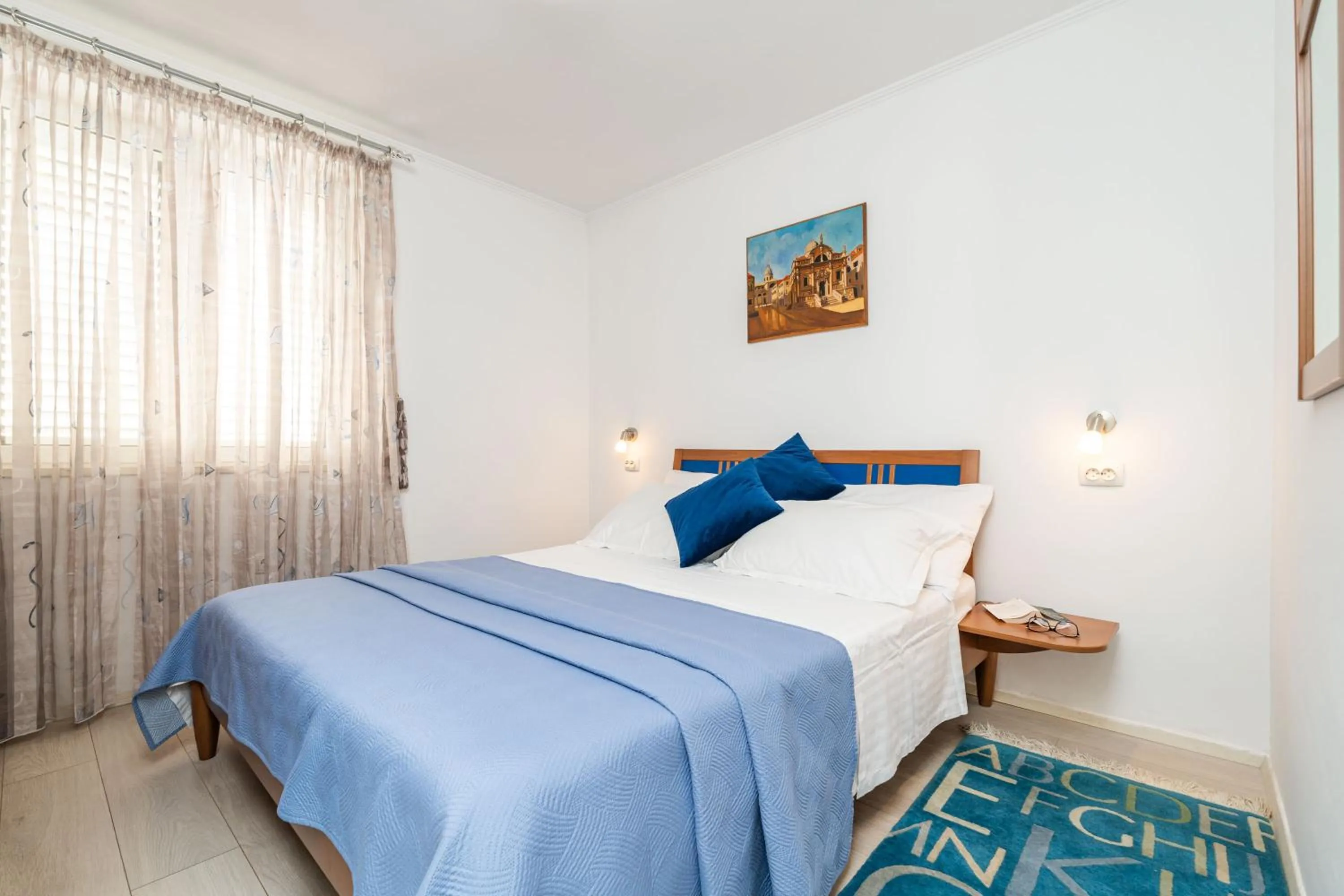 Bed in Apartments and Room Lora