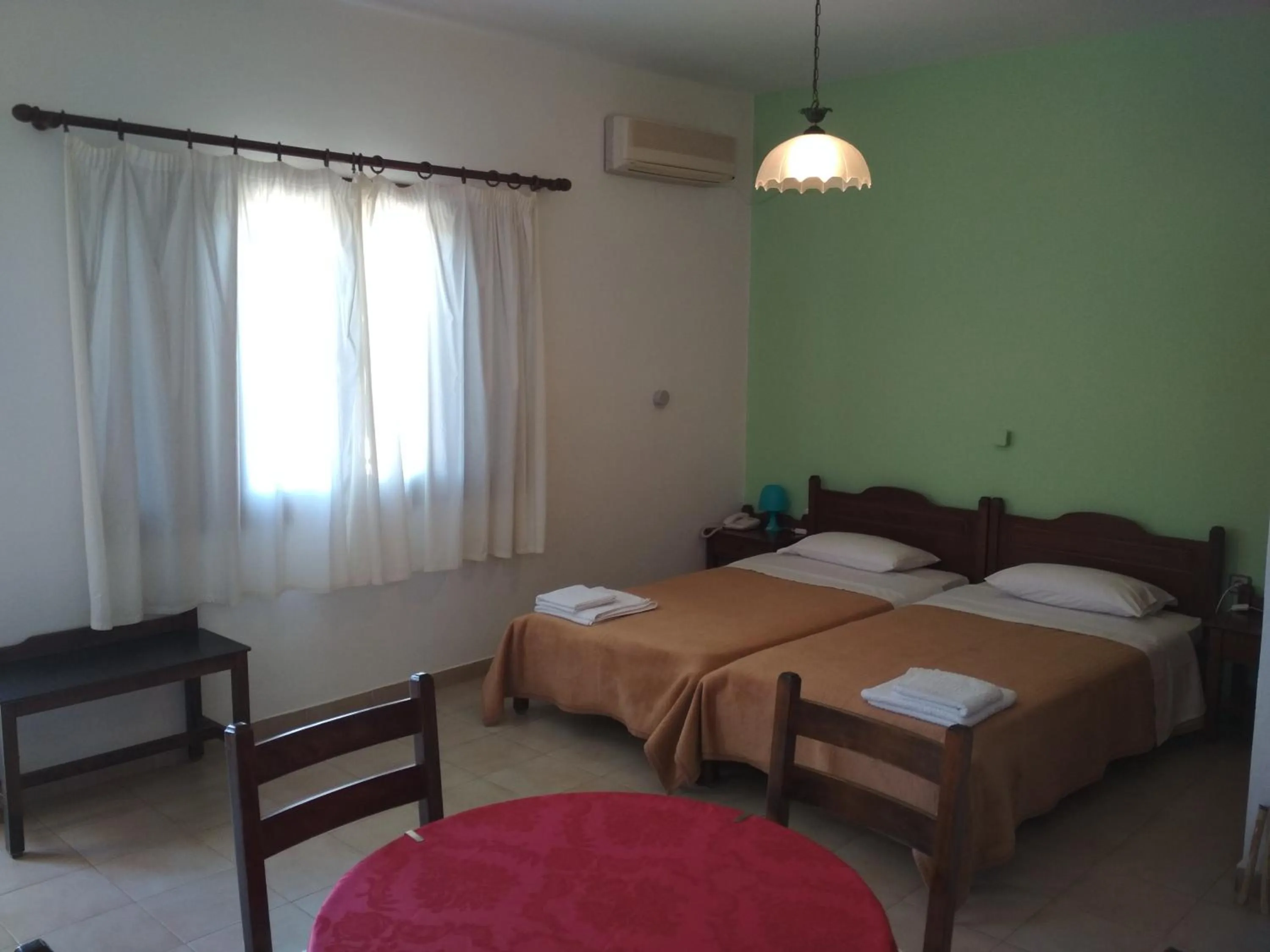 Bed in Flamingo Apartments