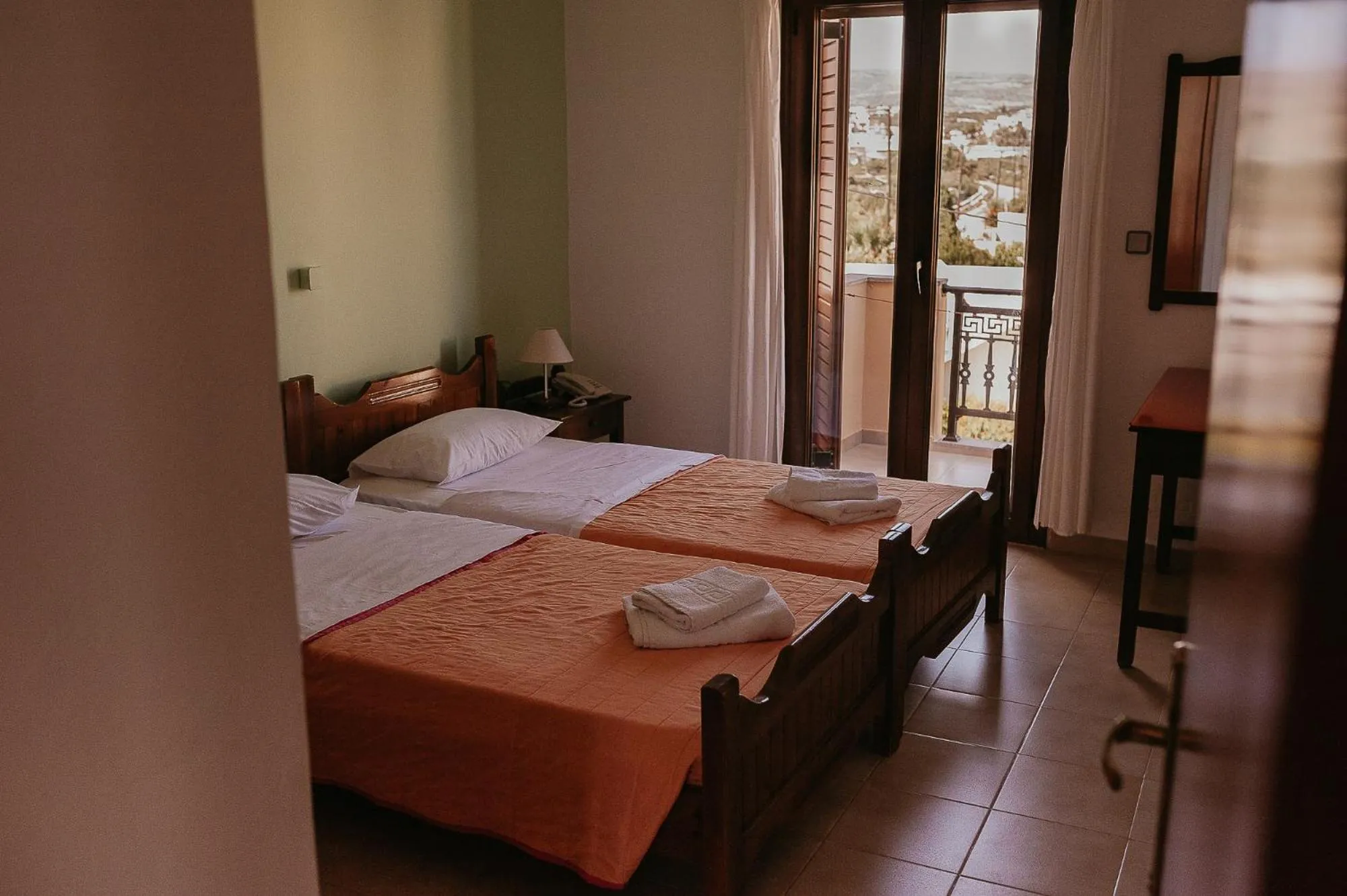 Bed in Flamingo Apartments