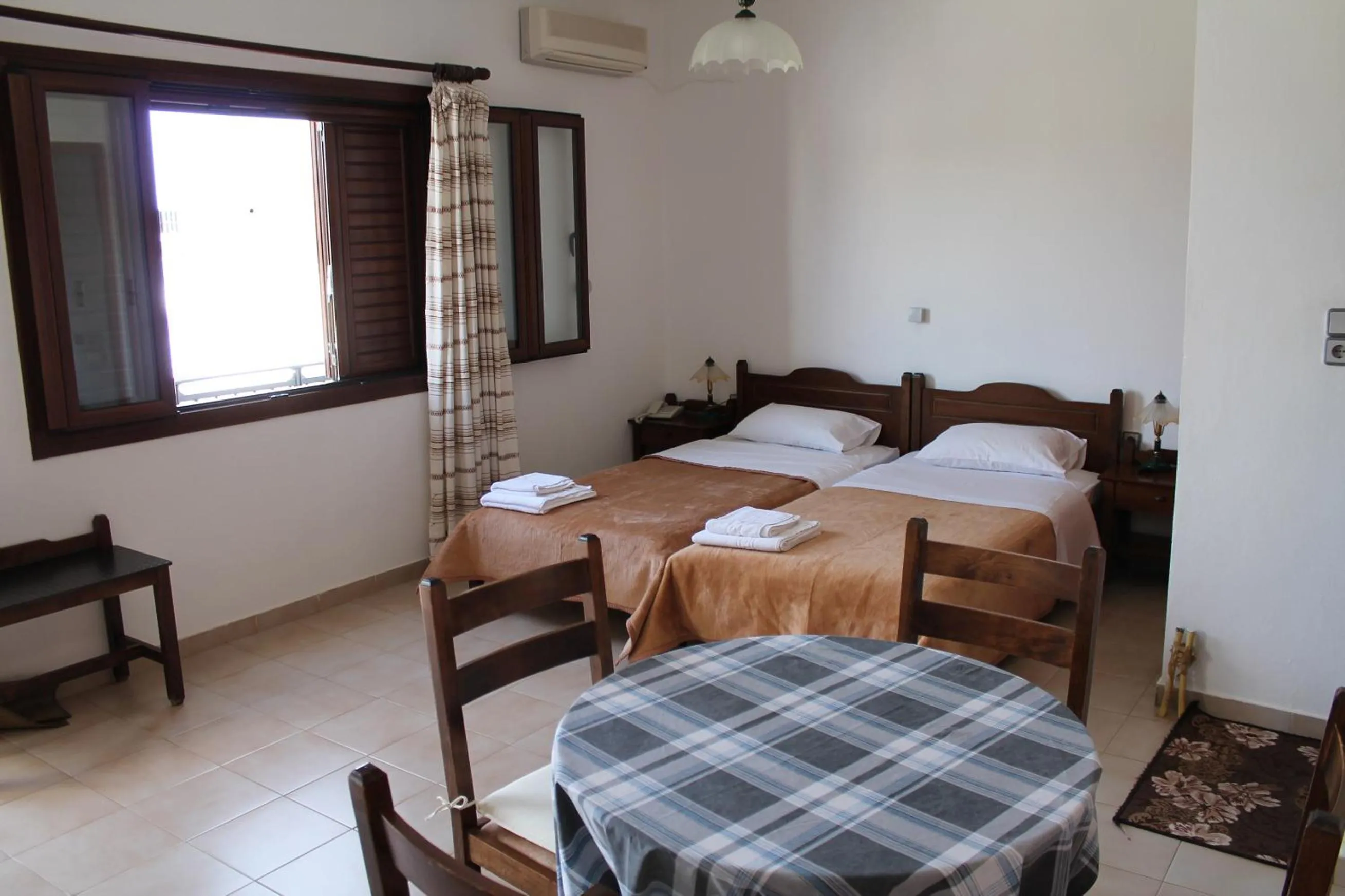 Bed in Flamingo Apartments