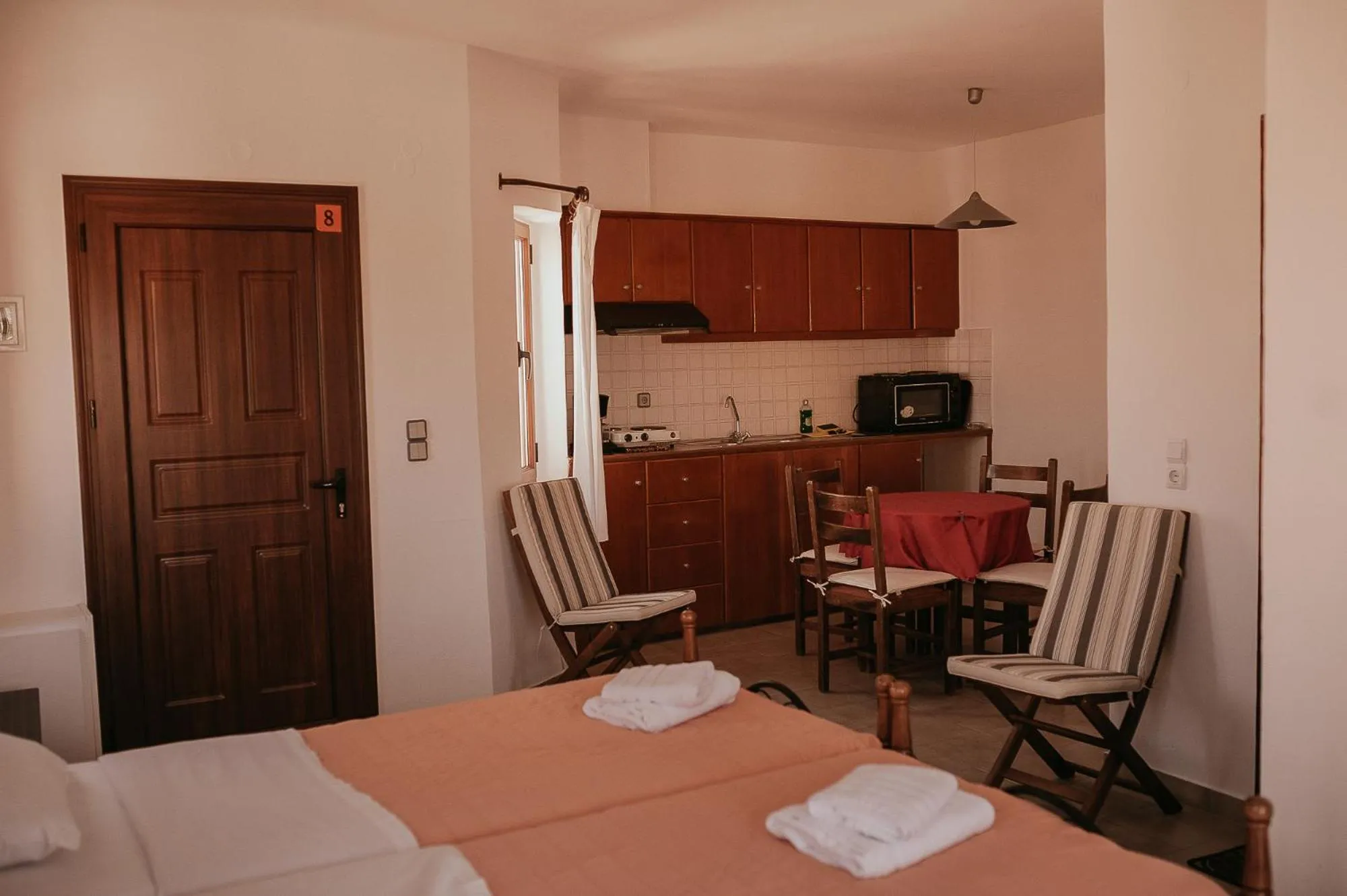 Bed in Flamingo Apartments