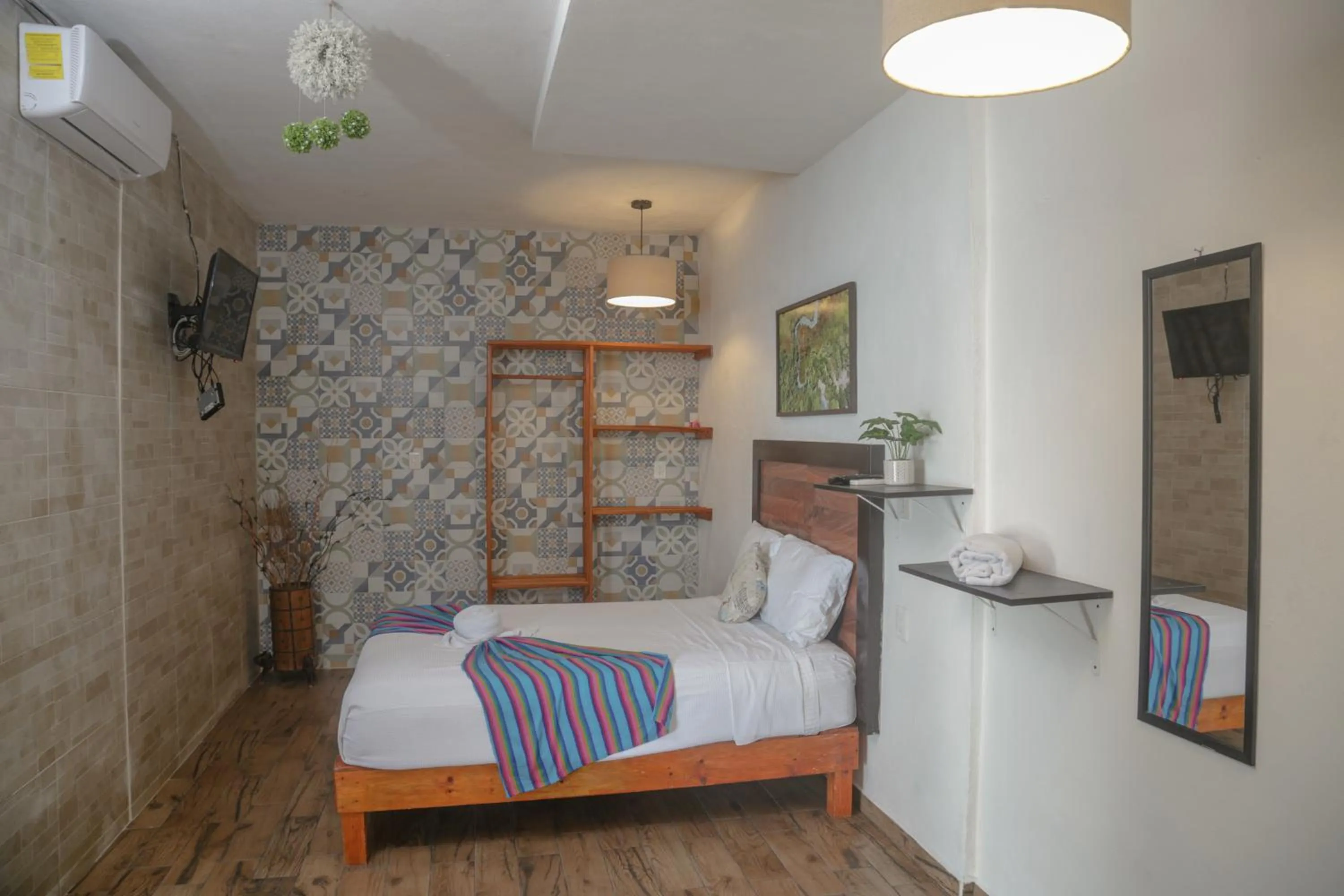 Bed in Seven Blue House Village & Lodge