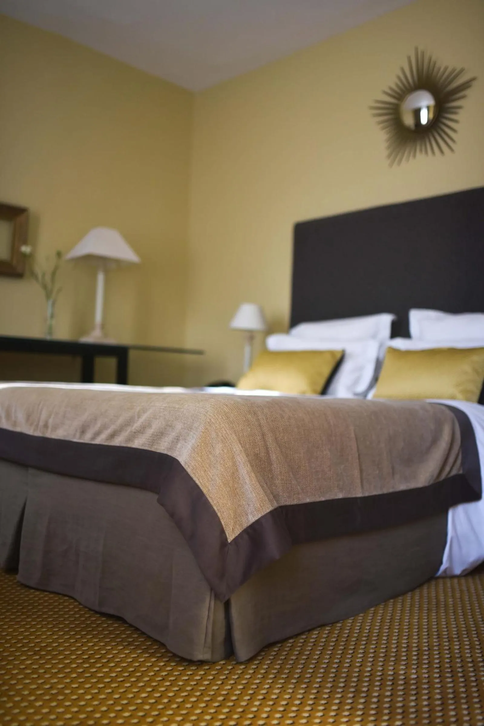 Bed in Grand Hôtel du Lion d'Or