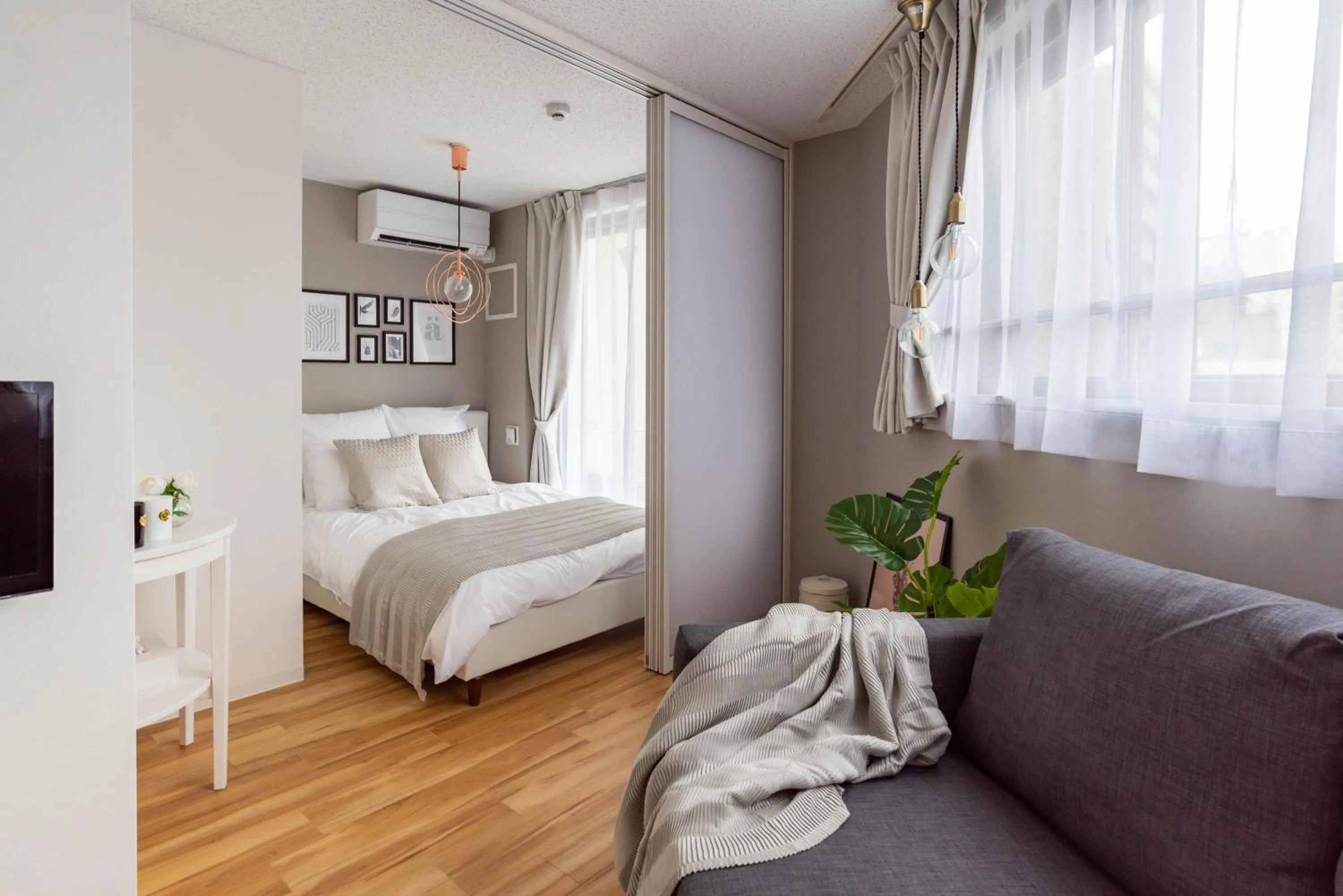 Living room, Bed in Exia Daikoku AFP Apartment