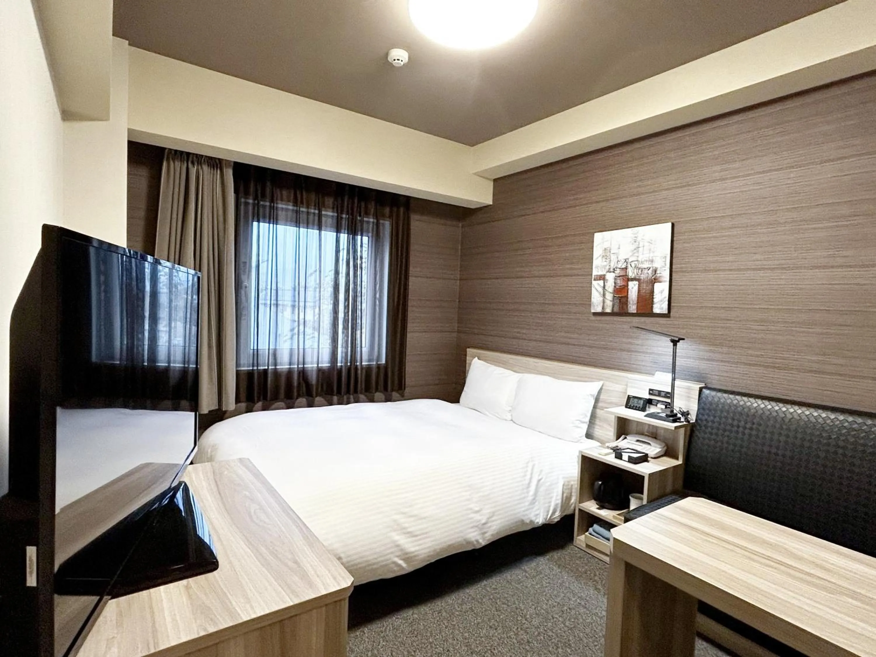 Photo of the whole room, Bed in Hotel Route-Inn Shinshiro
