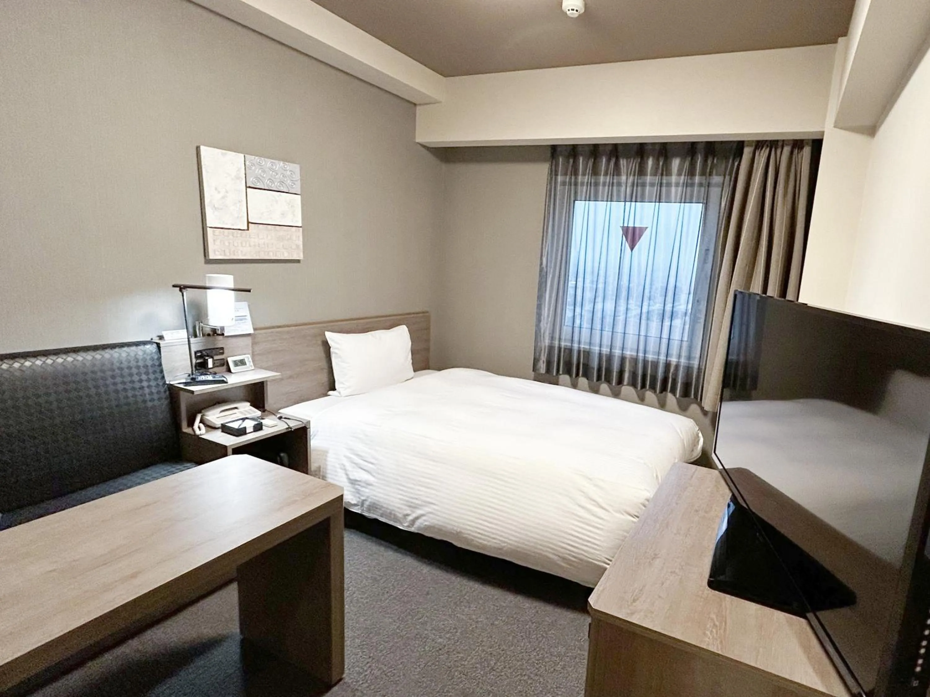 Photo of the whole room, Bed in Hotel Route-Inn Shinshiro