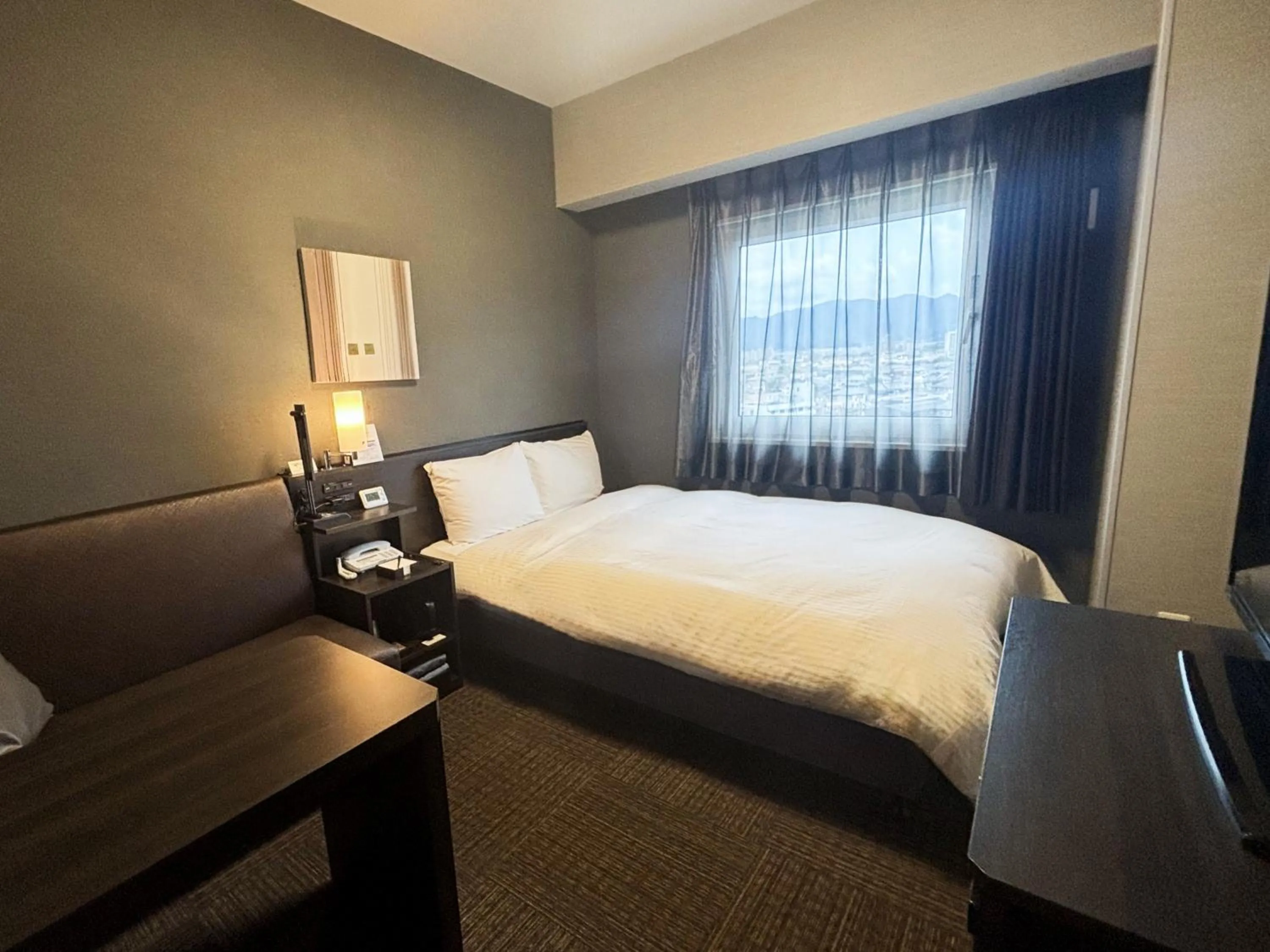 Photo of the whole room, Bed in Hotel Route-inn Yamaguchi Yuda Onsen