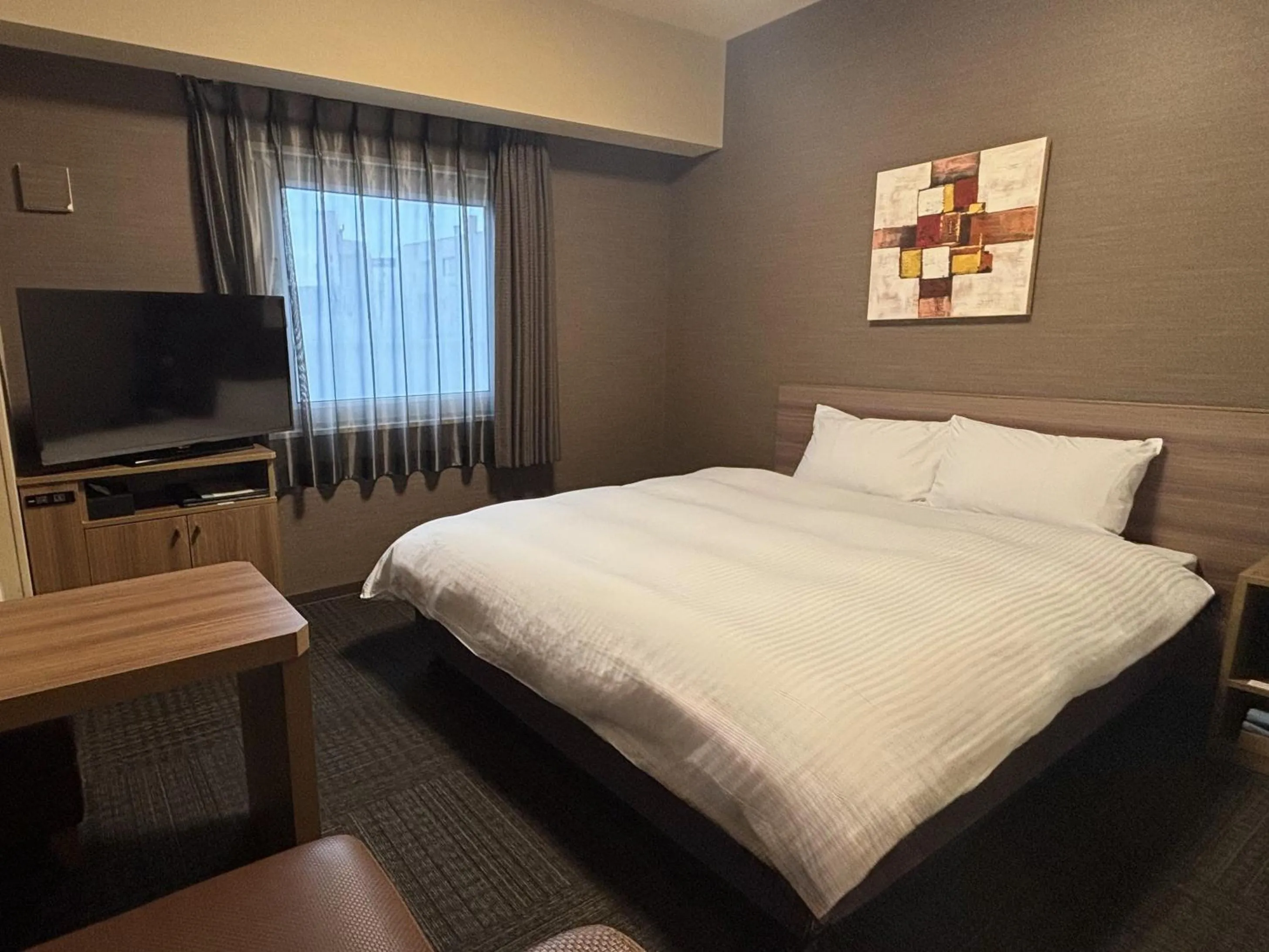 Photo of the whole room, Bed in Hotel Route-inn Yamaguchi Yuda Onsen