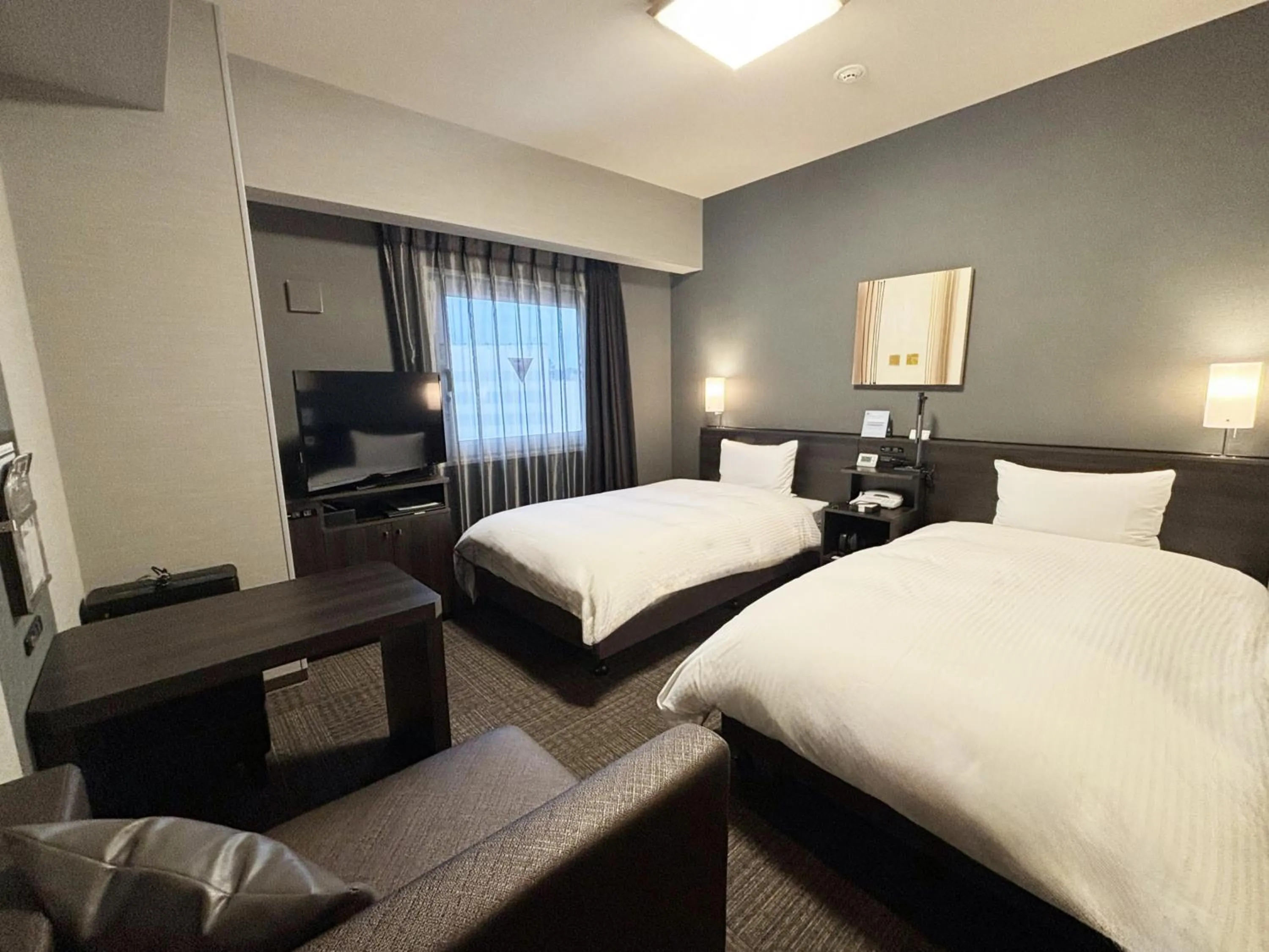 Photo of the whole room, Bed in Hotel Route-inn Yamaguchi Yuda Onsen