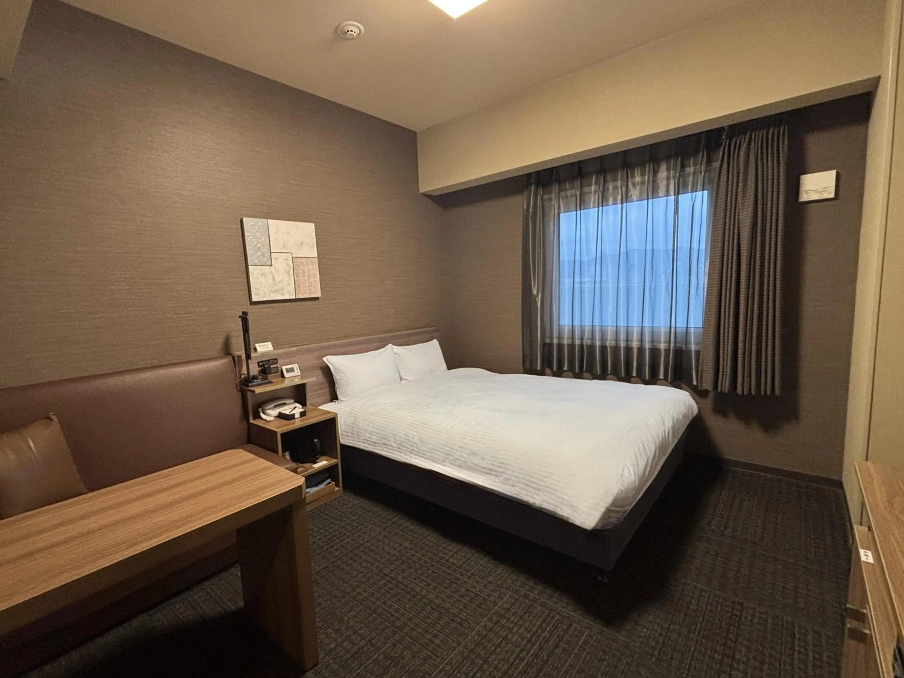 Photo of the whole room, Bed in Hotel Route-inn Yamaguchi Yuda Onsen