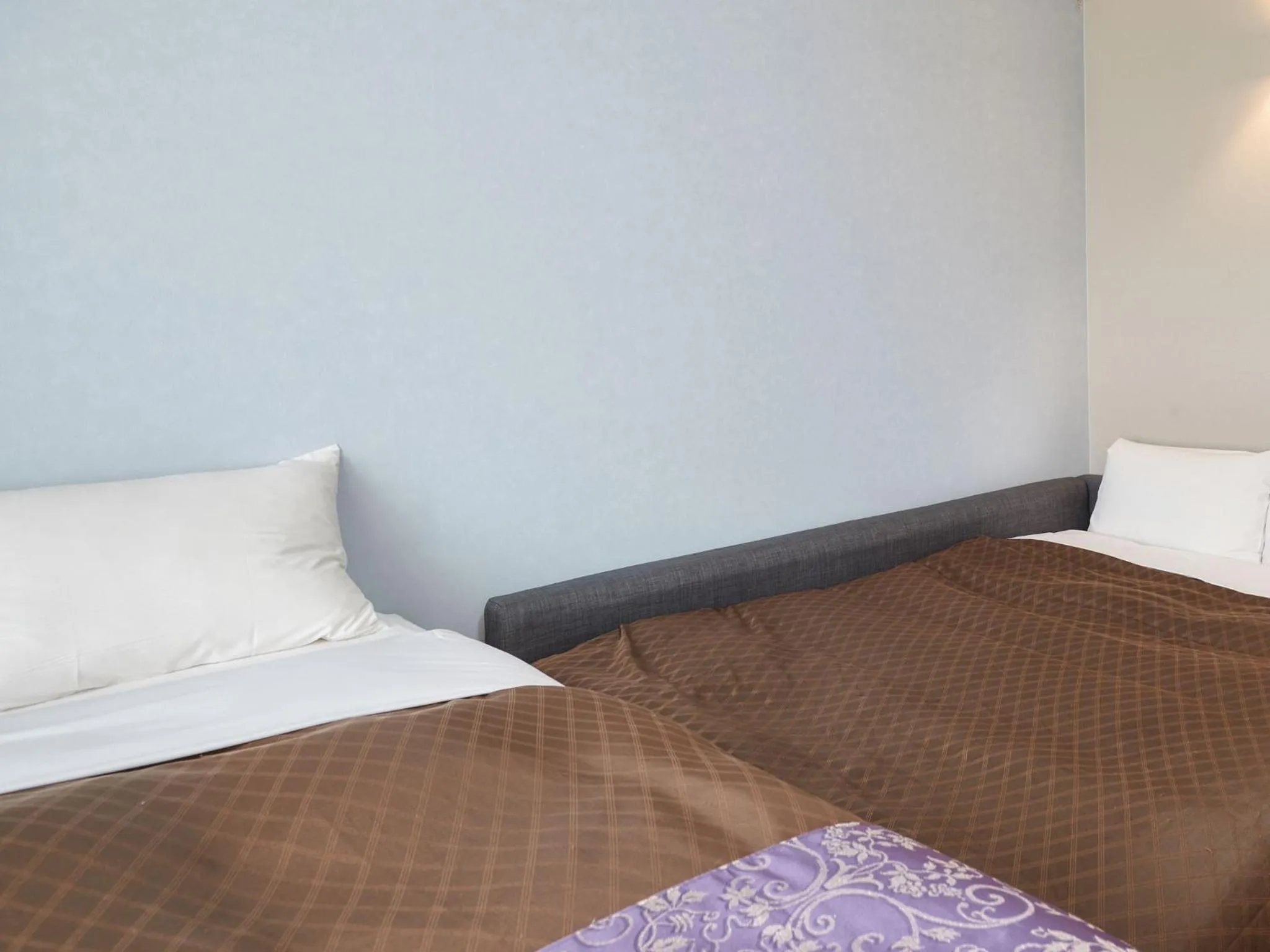 Bedroom, Bed in ミチ旅ホテル 読谷