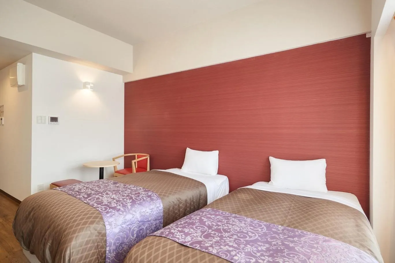 Bed in ミチ旅ホテル 読谷