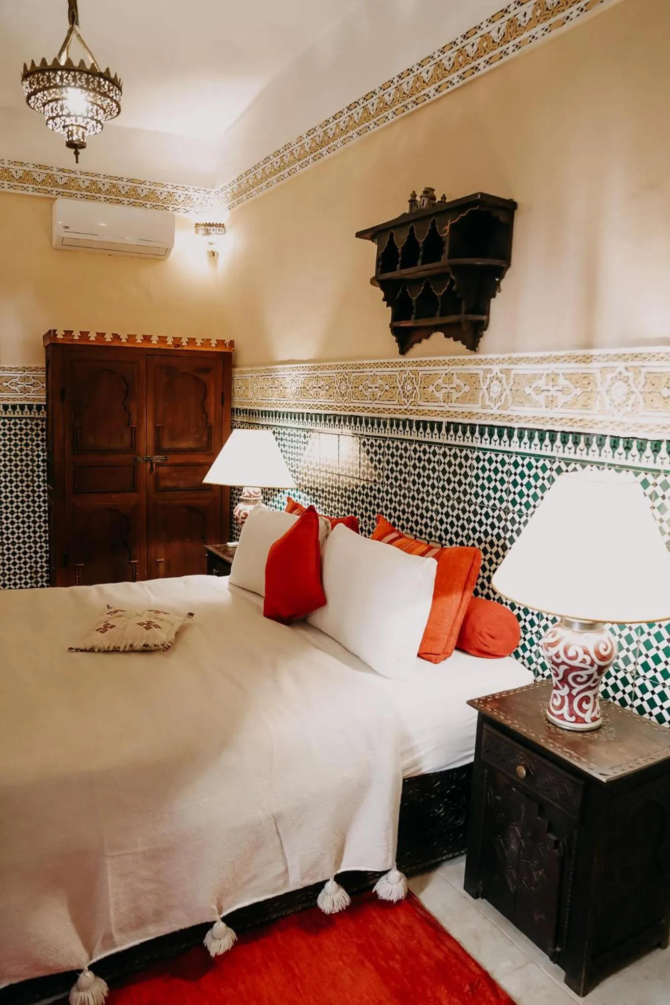 Bed in Riad Hotel Sherazade