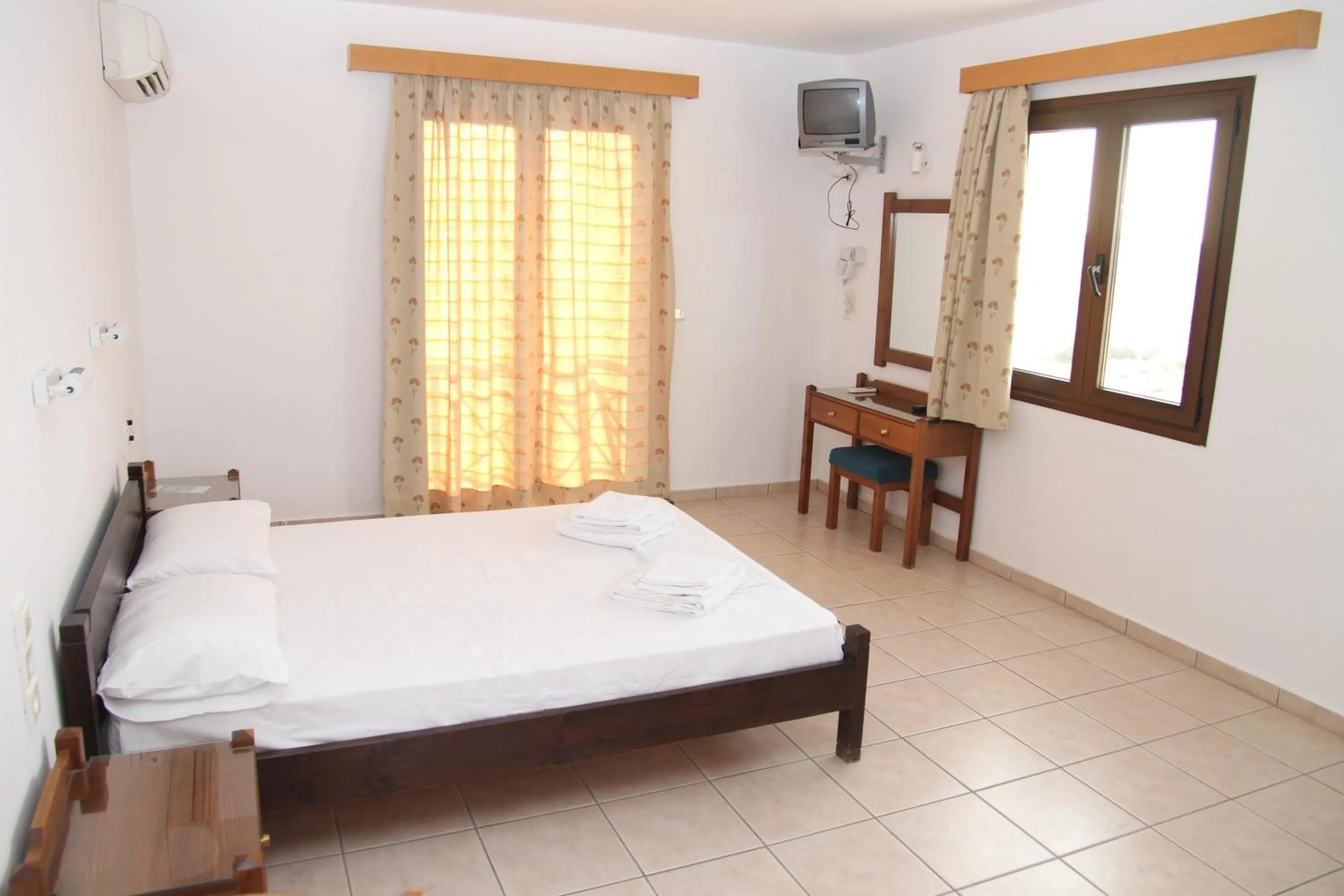 Bed in Pennystella Apartments