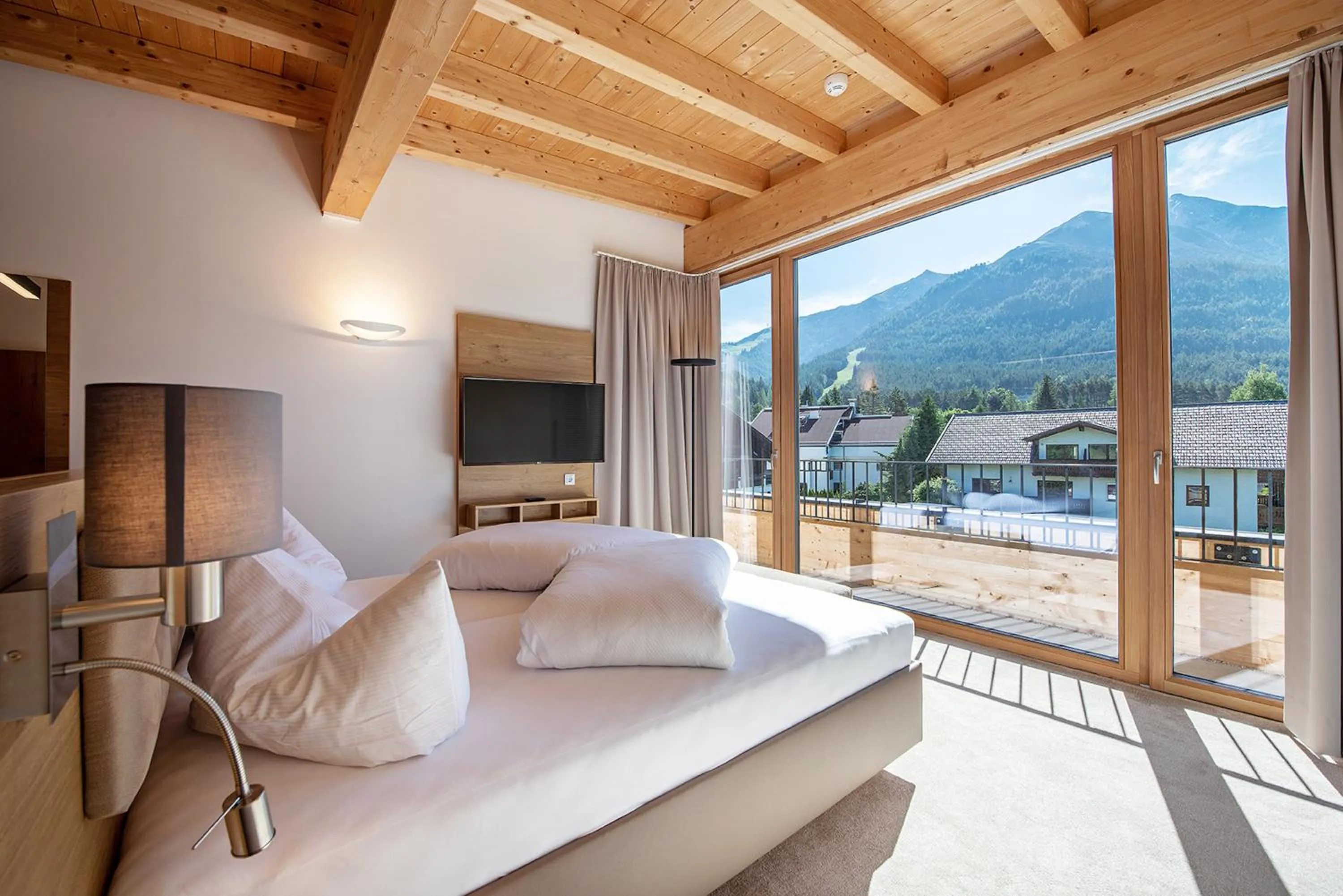 Photo of the whole room, Bed in GOTTHARD - FINE LIVING APARTMENTS