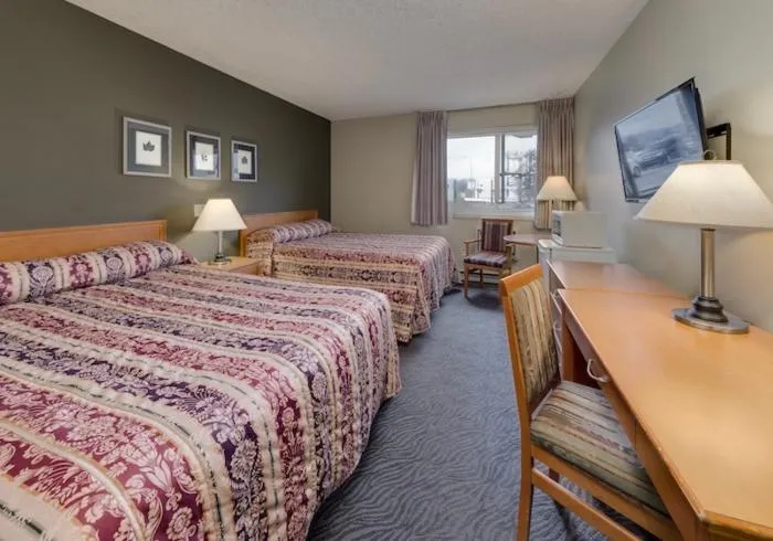 Bed in Heritage Inn Hotel & Convention Centre - Taber
