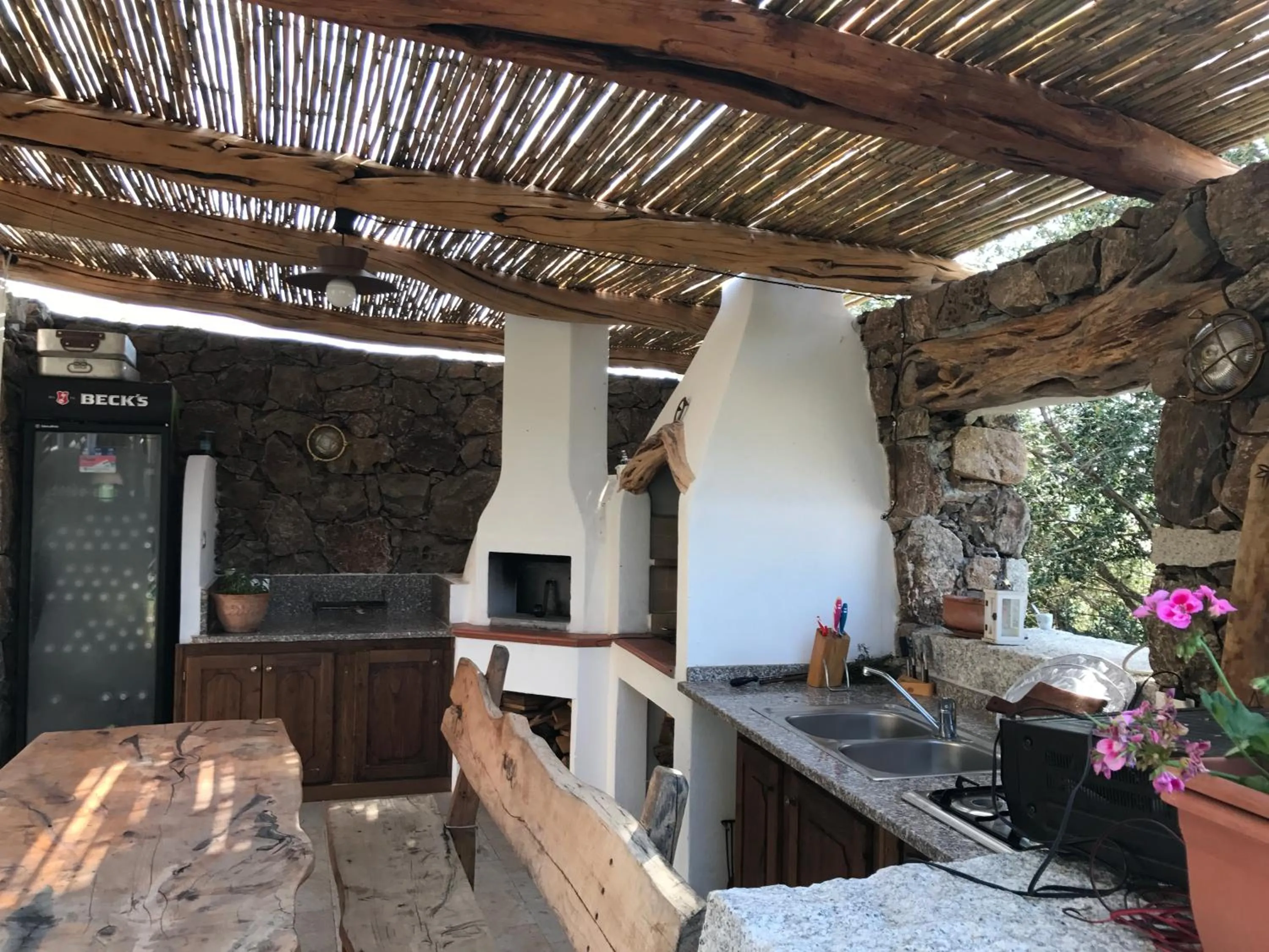 BBQ facilities in Il Giardino di Daniela Apartments