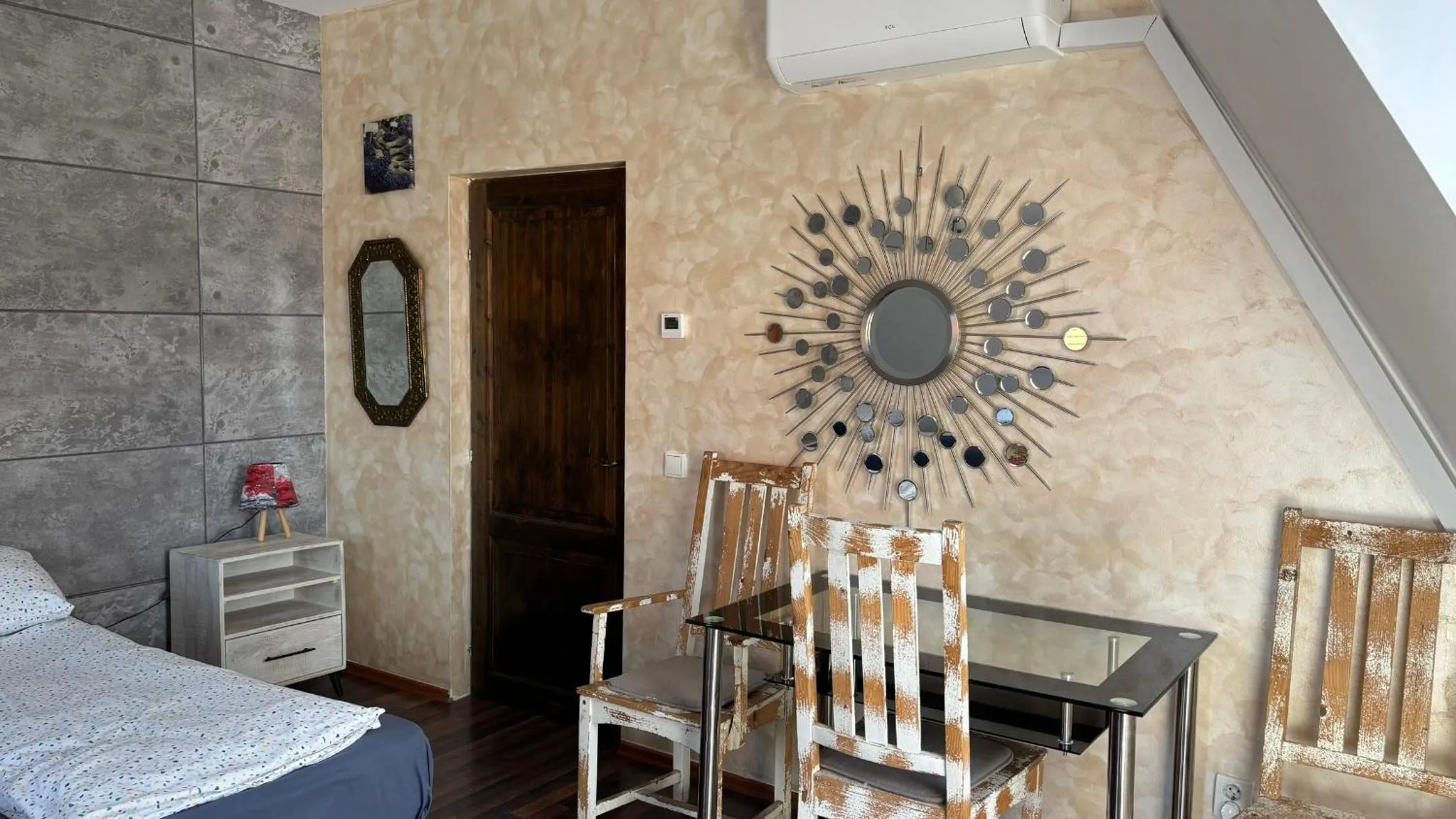 Bed in Pannónia Rooms and Apartments