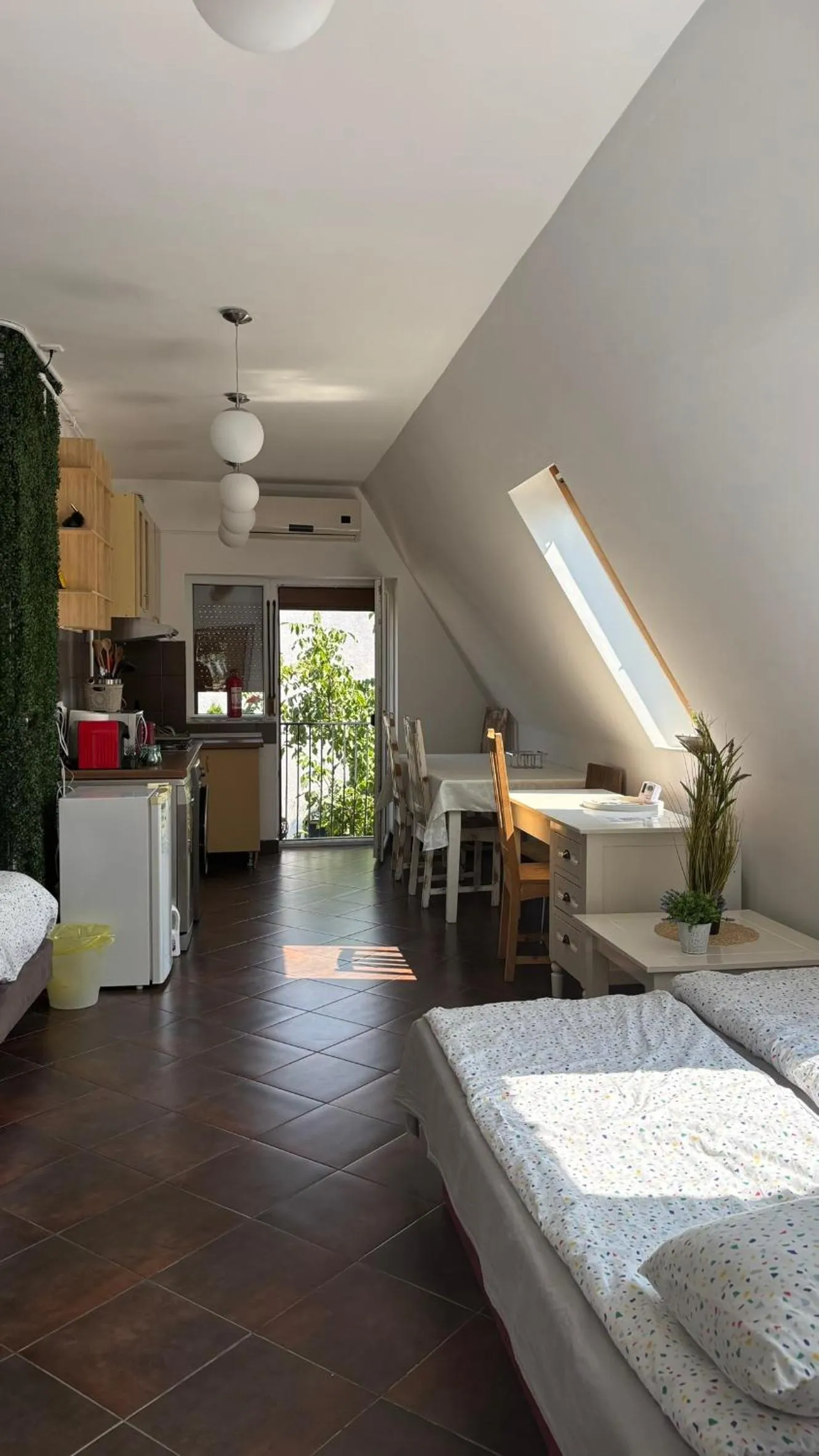 Bed in Pannónia Rooms and Apartments