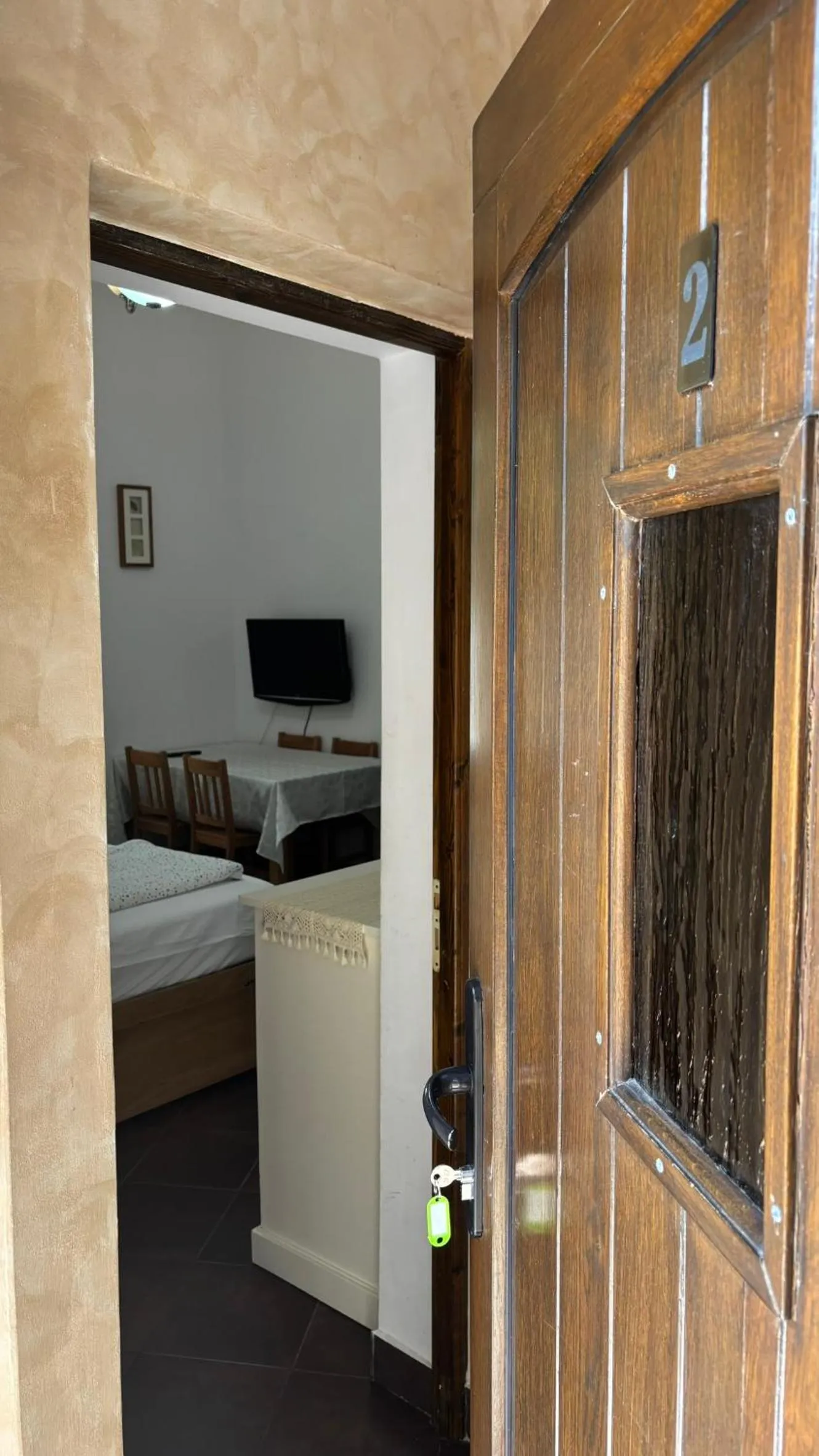 Bed in Pannónia Rooms and Apartments