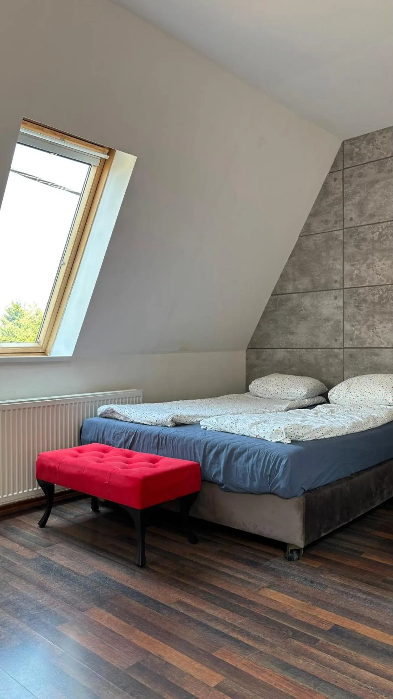 Bed in Pannónia Rooms and Apartments